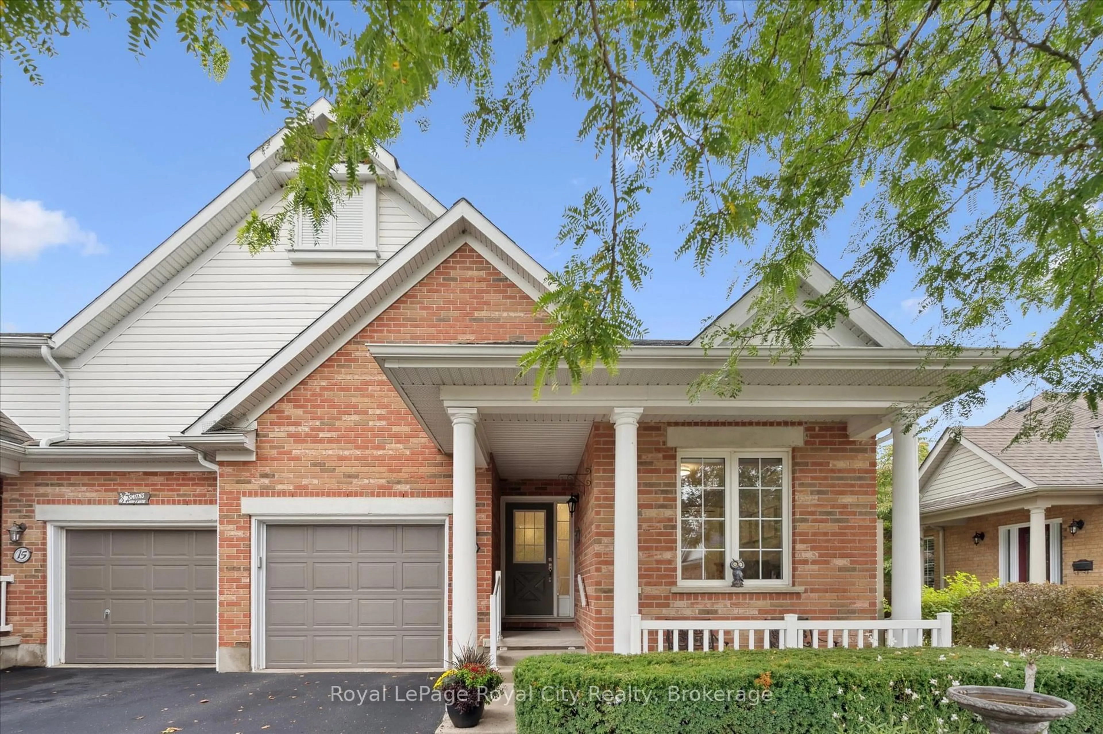 Home with brick exterior material, street for 11 Magnolia Lane, Guelph Ontario N1G 4X7