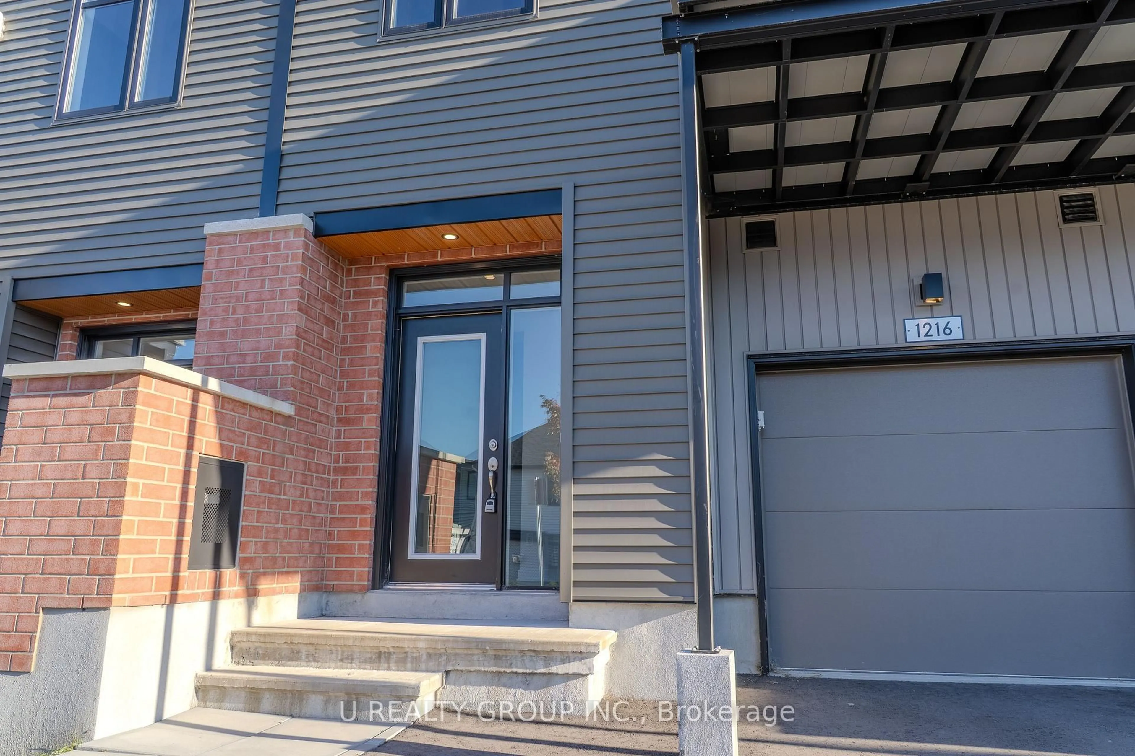 Home with brick exterior material, street for 1216 Flycatcher Private, Ottawa Ontario K1X 0M7