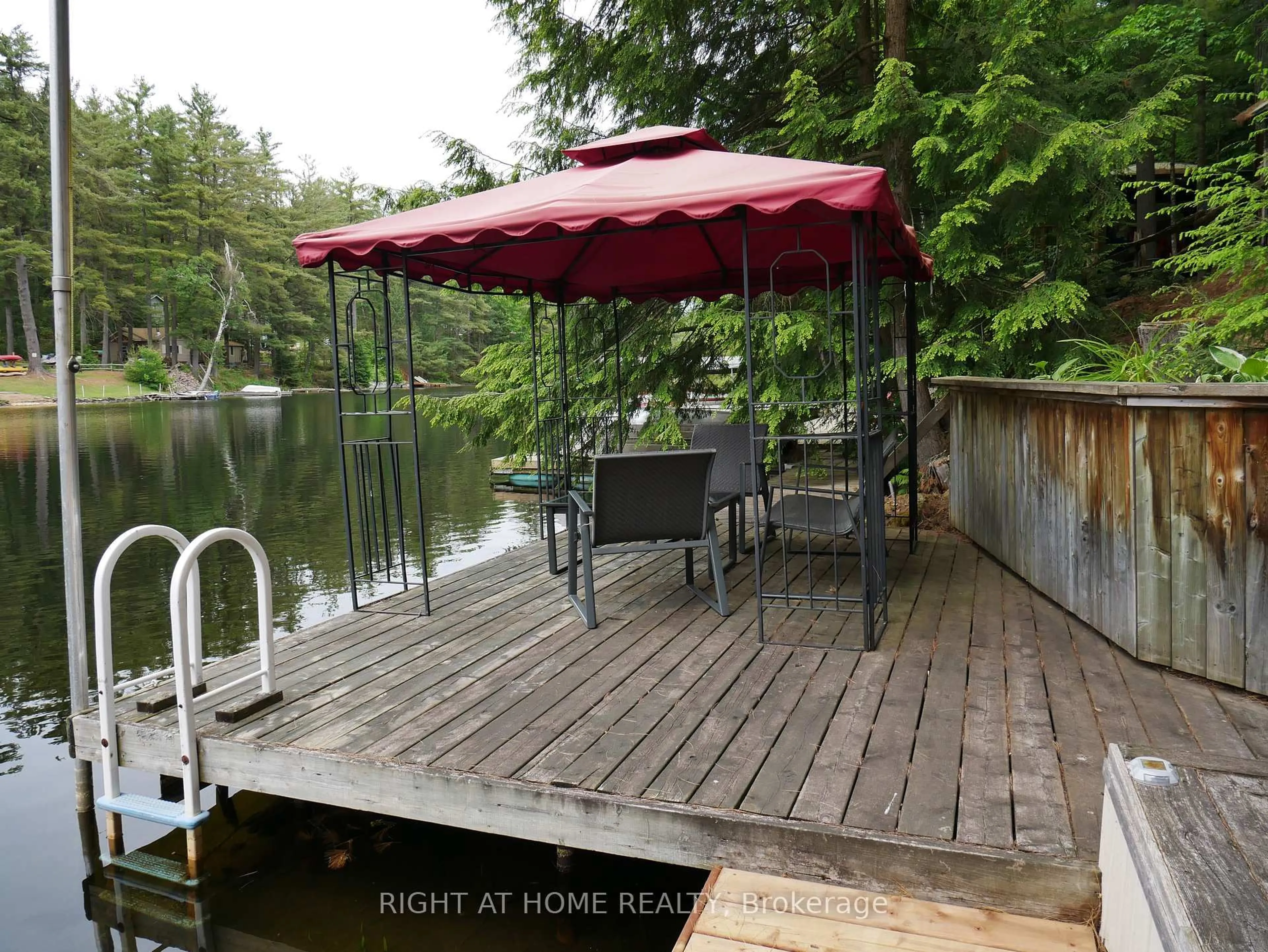 Patio, water/lake/river/ocean view for 1130 Towering Oaks Tr, Minden Hills Ontario K0M 2L1