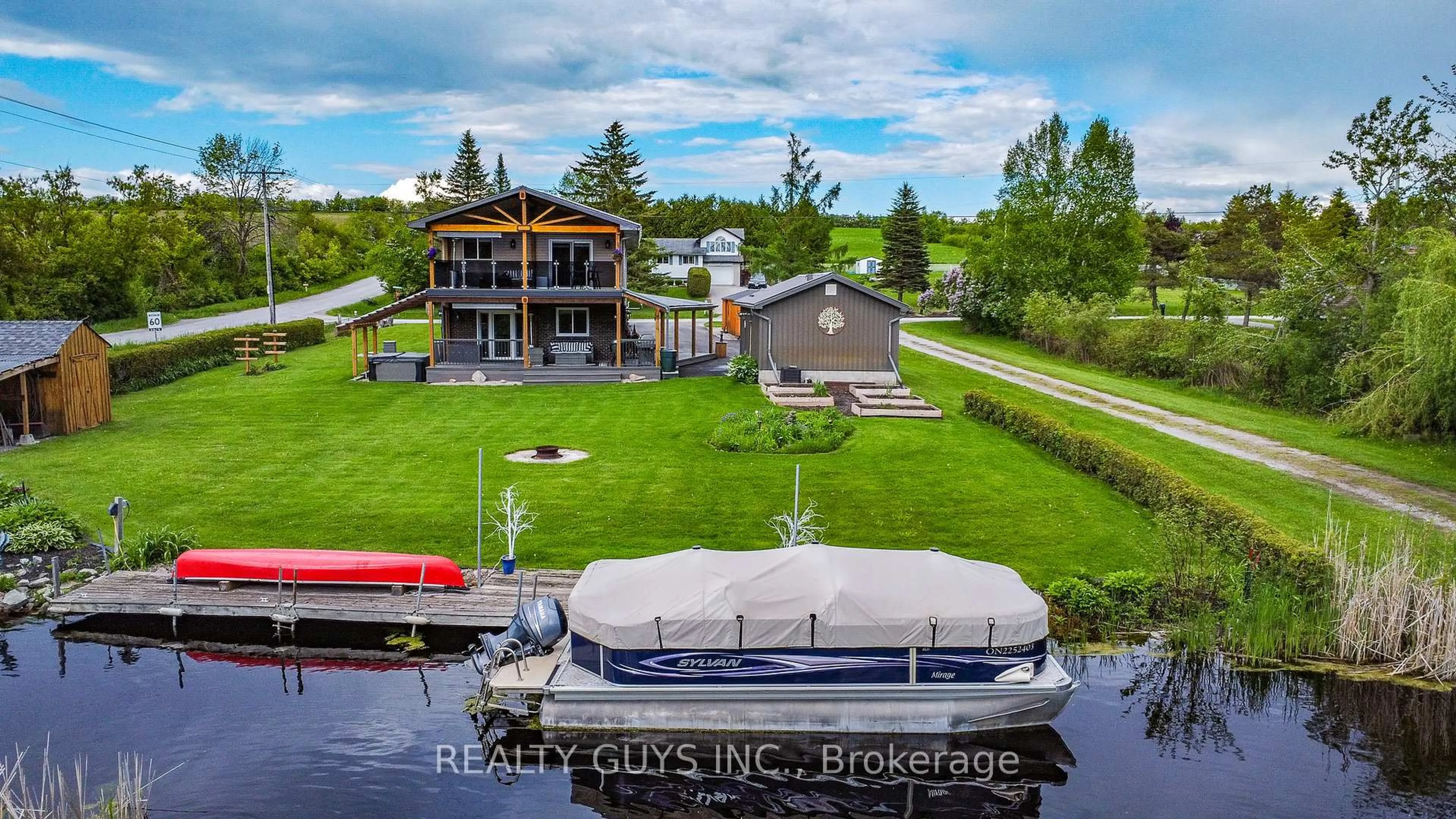 A pic from outside/outdoor area/front of a property/back of a property/a pic from drone, water/lake/river/ocean view for 4 Cadillac Blvd, Kawartha Lakes Ontario K0L 2W0
