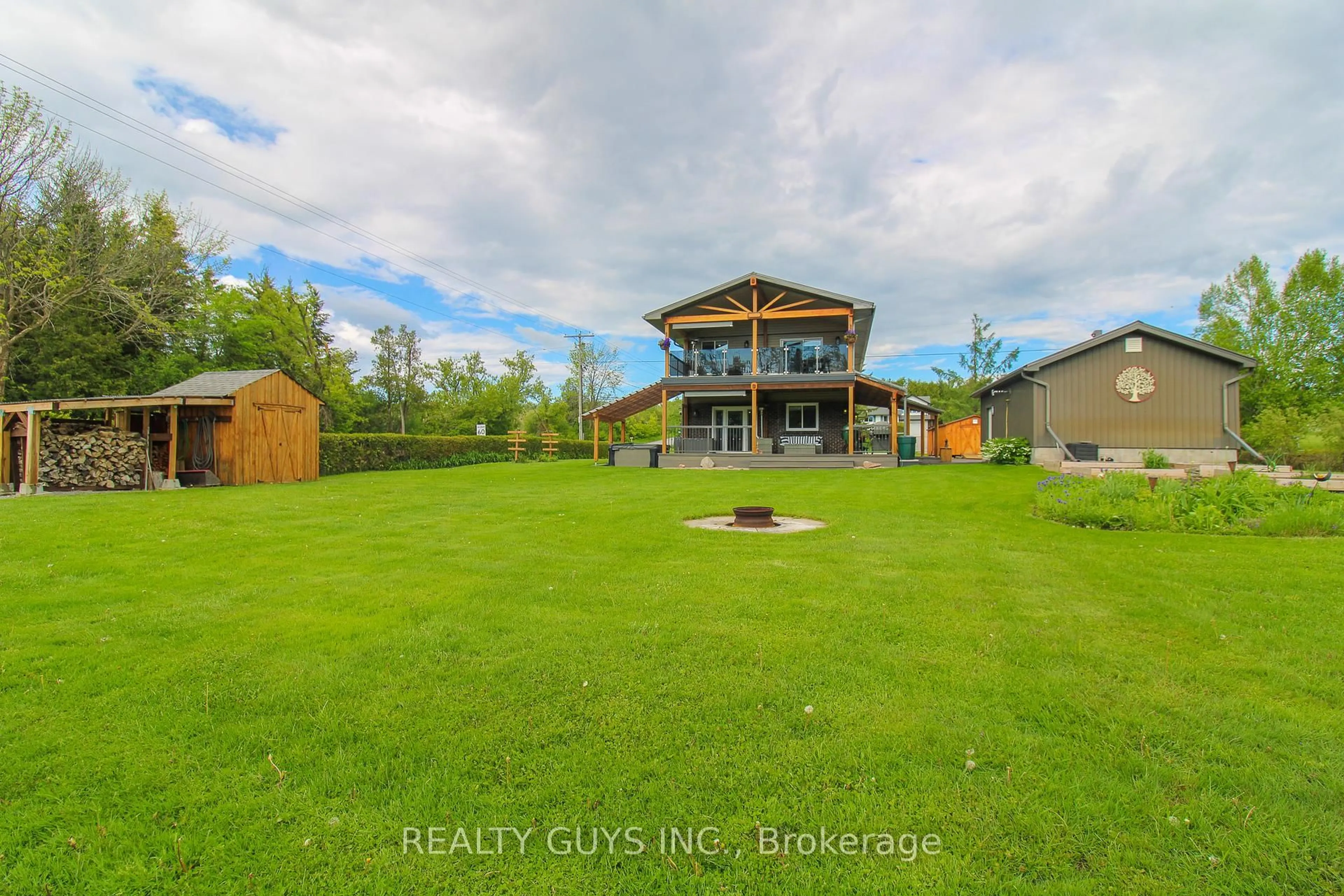 A pic from outside/outdoor area/front of a property/back of a property/a pic from drone, water/lake/river/ocean view for 4 Cadillac Blvd, Kawartha Lakes Ontario K0L 2W0