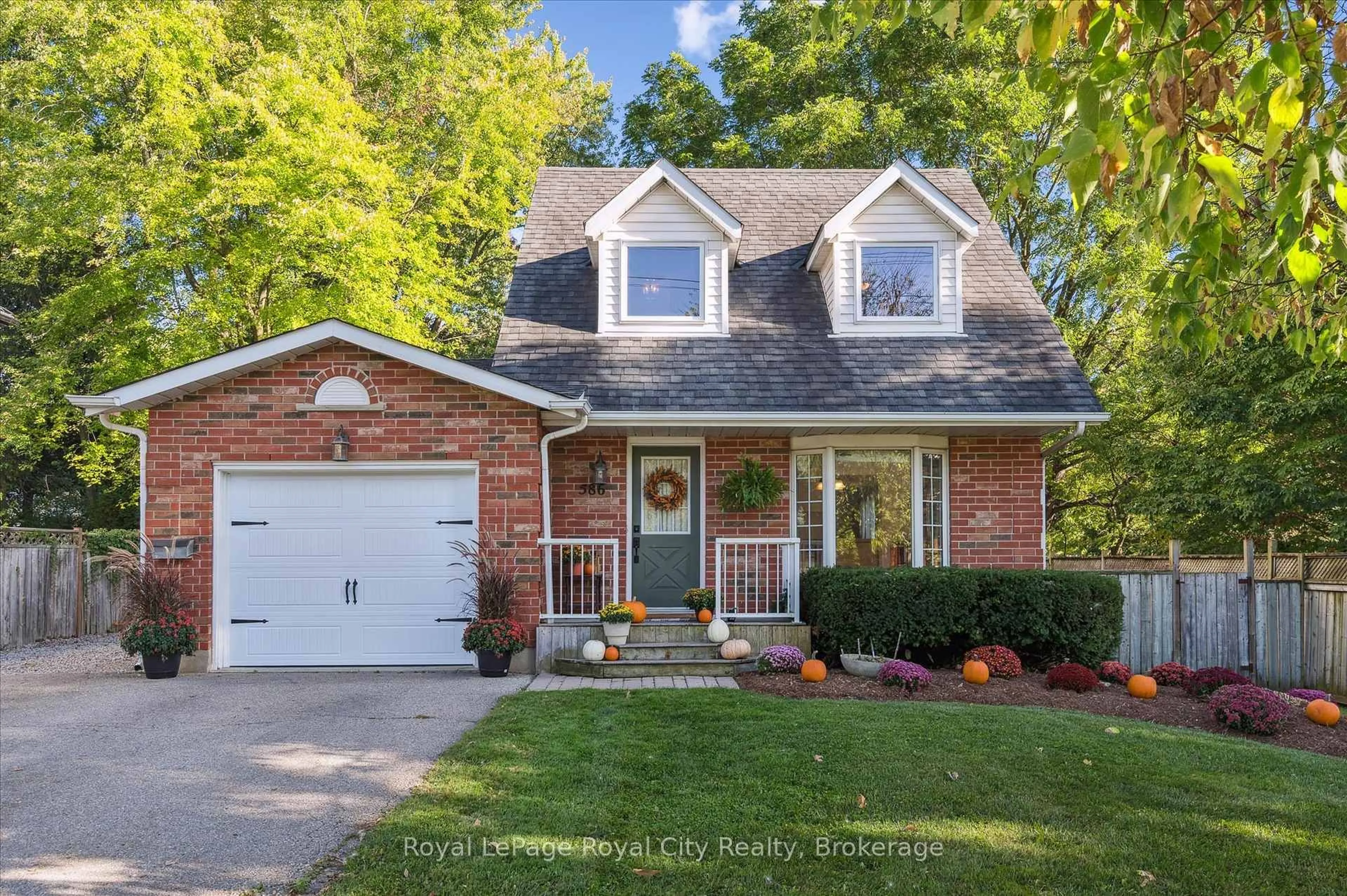 Home with brick exterior material, street for 586 Kortright Rd, Guelph Ontario N1G 3H8