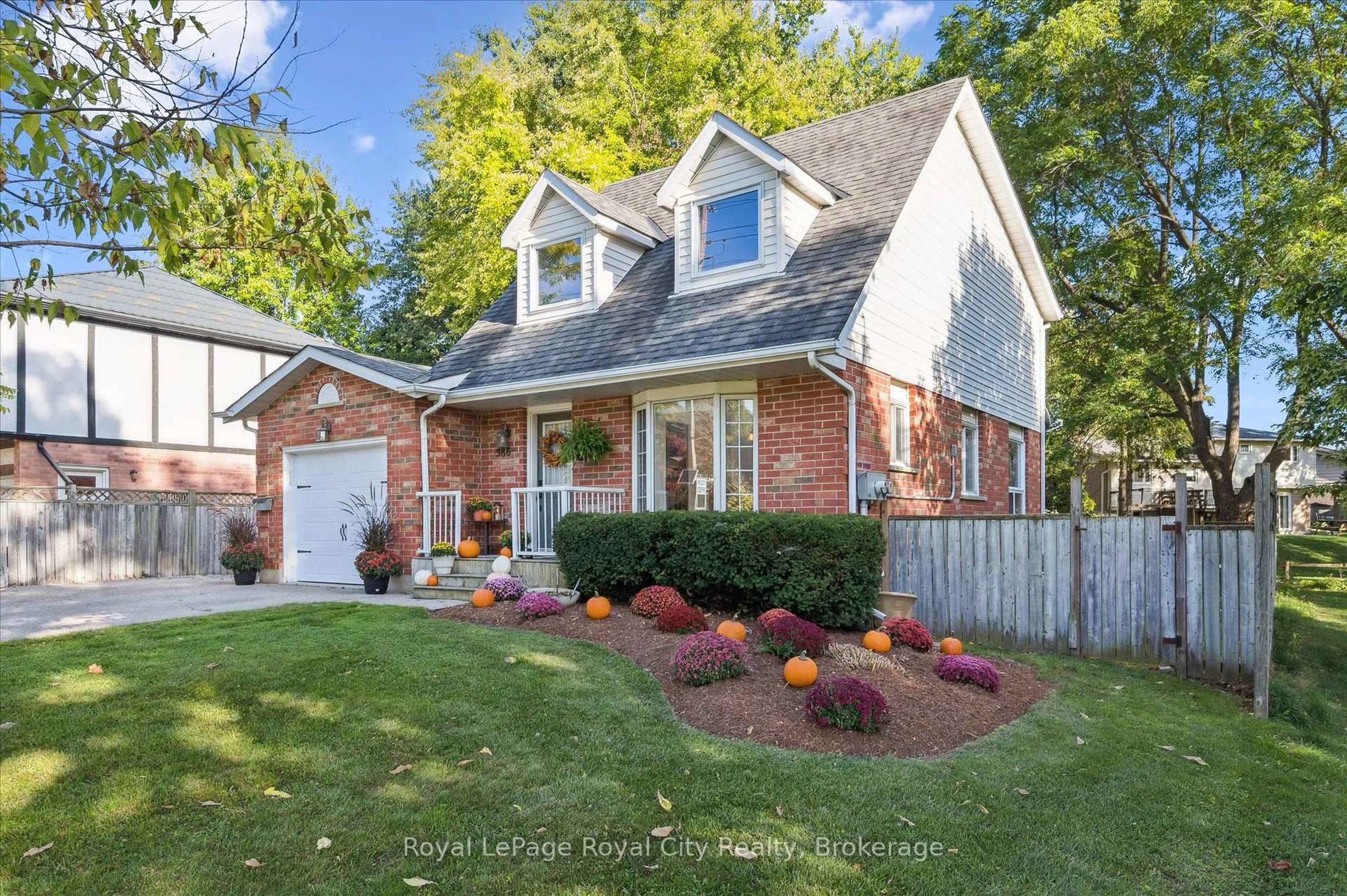 Home with brick exterior material, street for 586 Kortright Rd, Guelph Ontario N1G 3H8