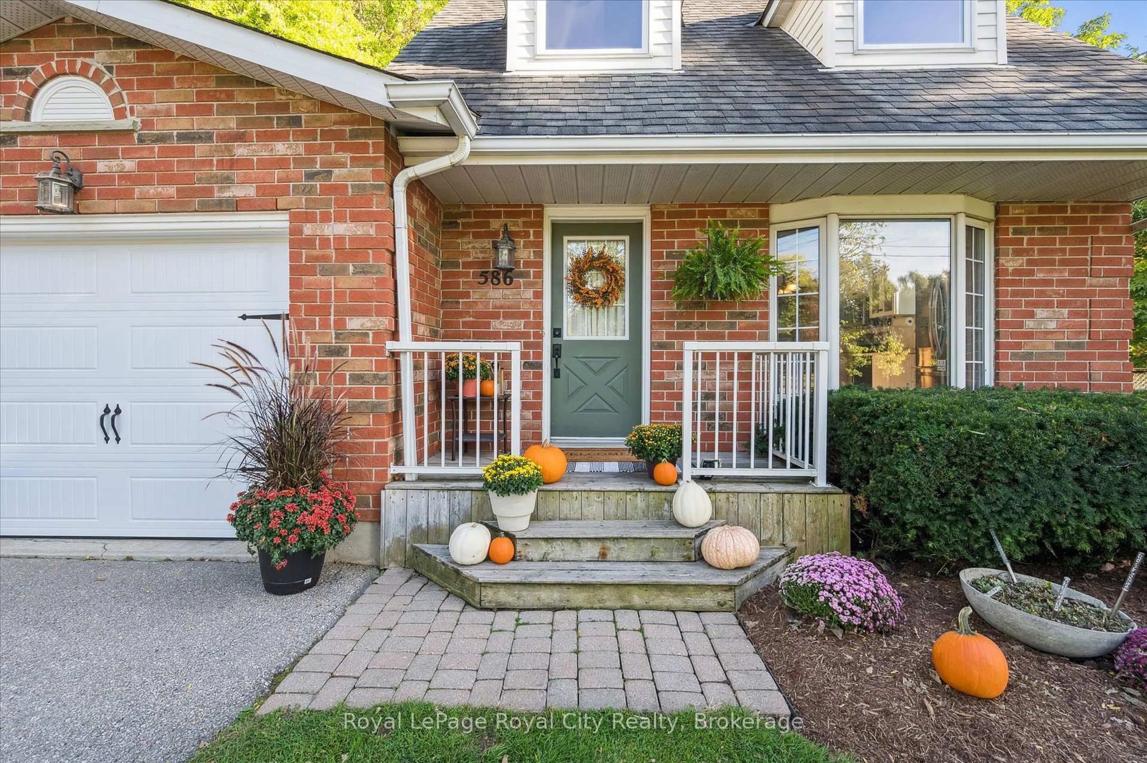 Home with brick exterior material, street for 586 Kortright Rd, Guelph Ontario N1G 3H8