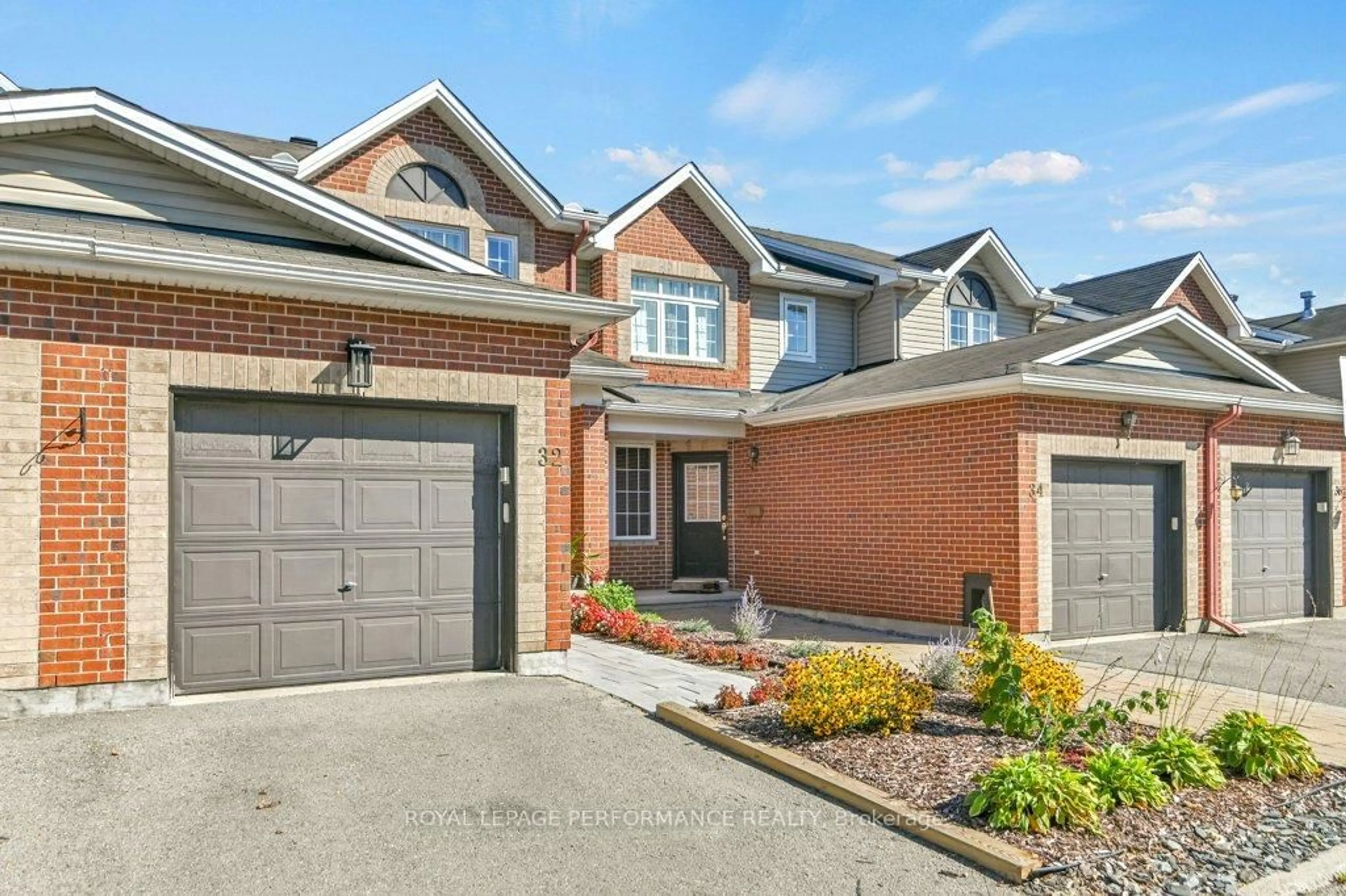 Home with brick exterior material, street for 32 Cargrove Private, Ottawa Ontario K1K 4Y6