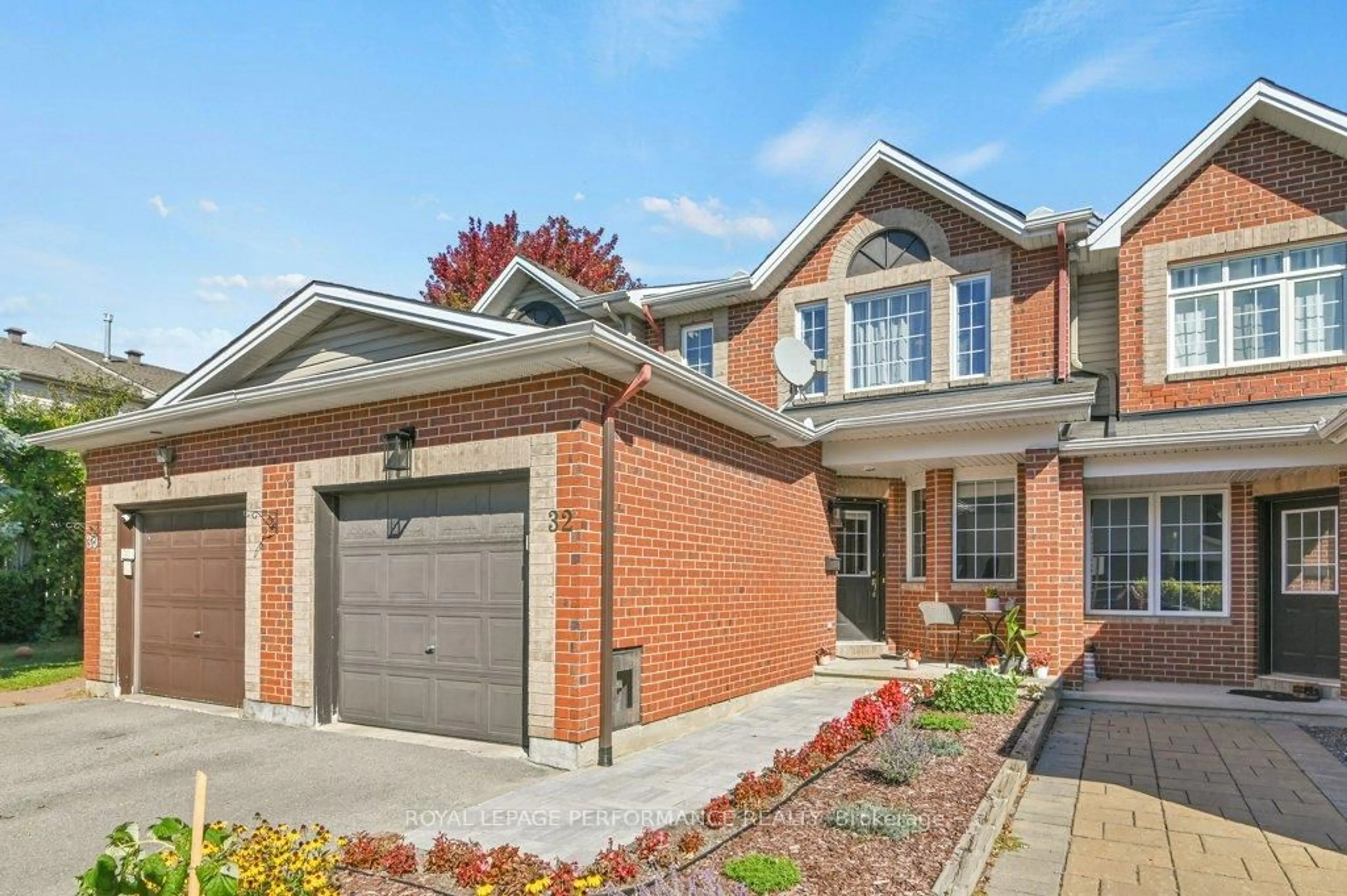 Home with brick exterior material, street for 32 Cargrove Private, Ottawa Ontario K1K 4Y6