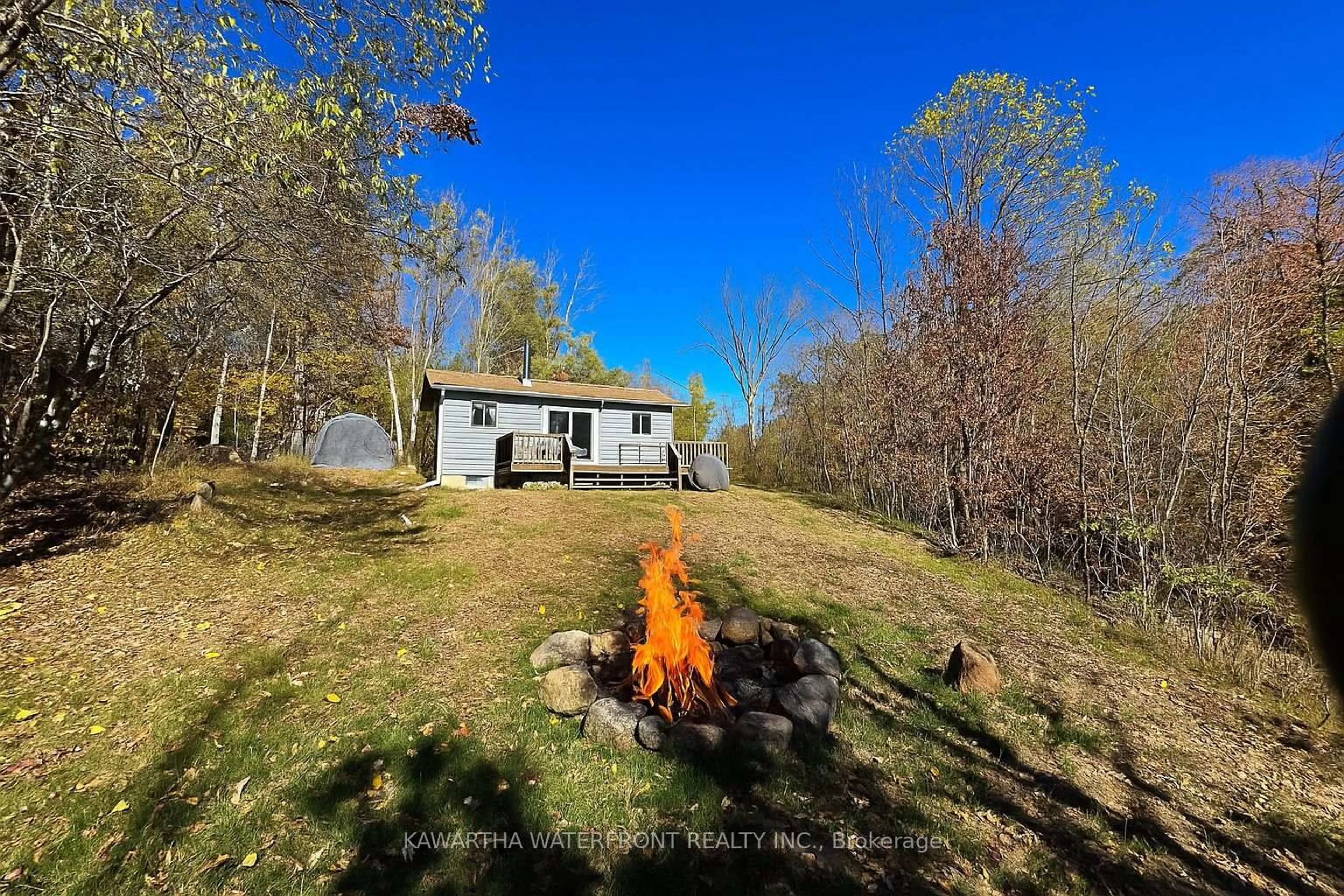 A pic from outside/outdoor area/front of a property/back of a property/a pic from drone, unknown for 1120 English Circ, Highlands East Ontario K0M 1R0