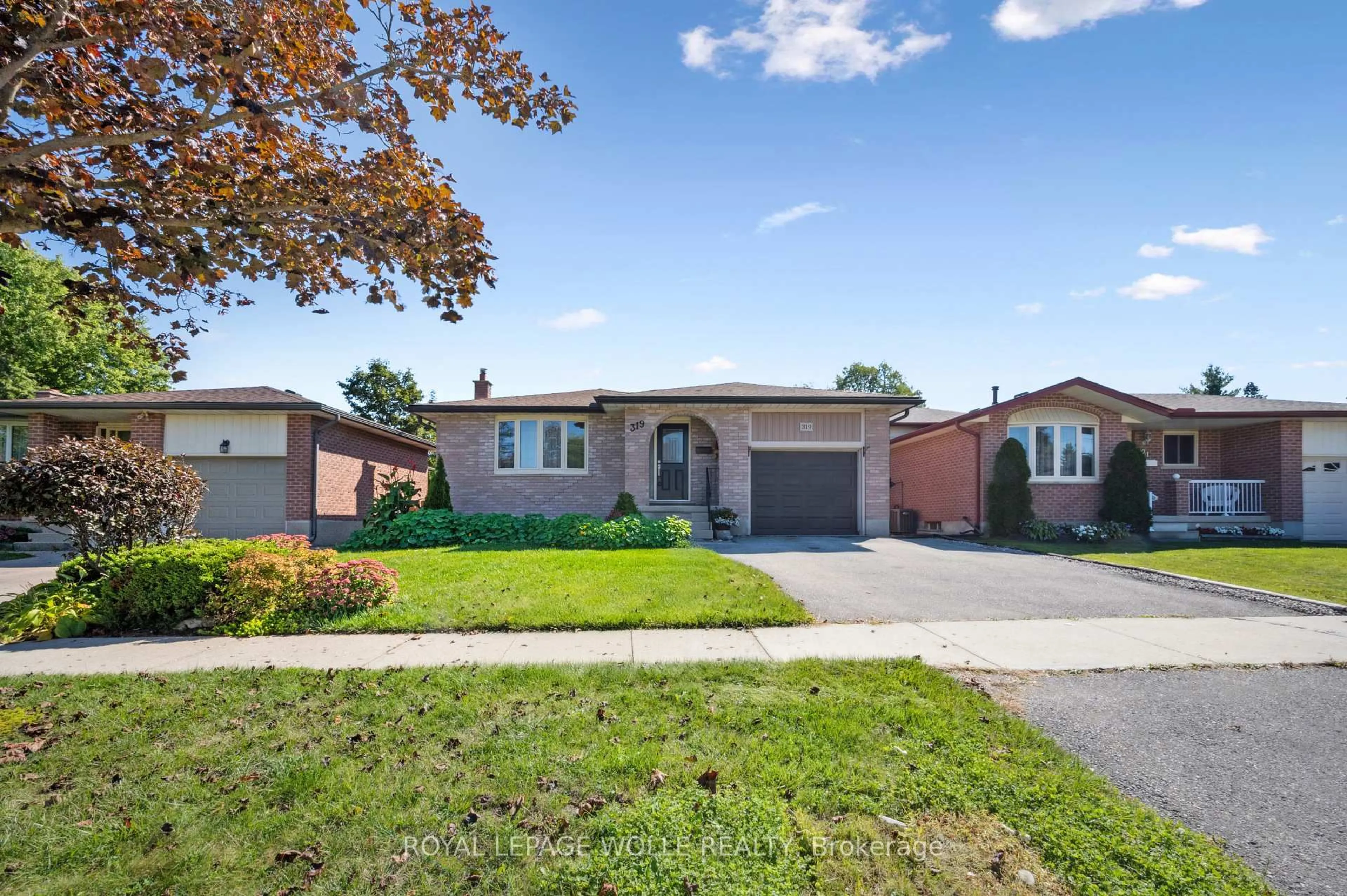 Home with brick exterior material, street for 319 Conservation Dr, Waterloo Ontario N2V 1V2