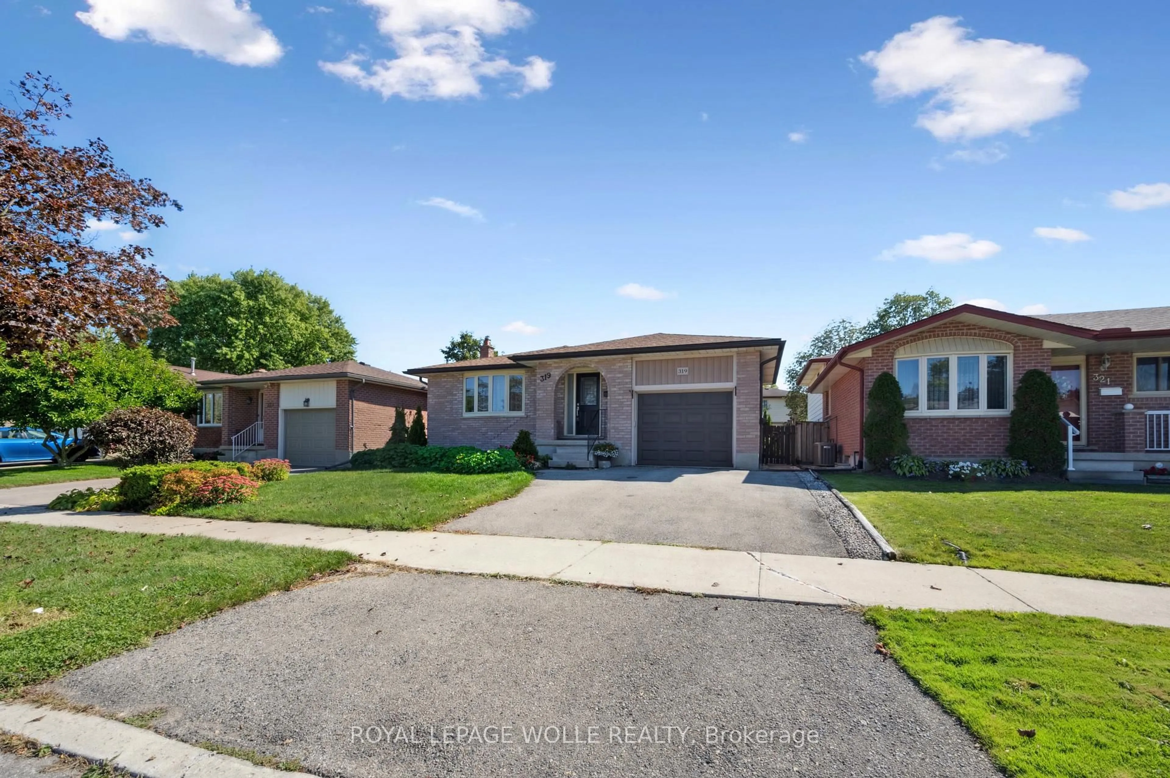 Home with brick exterior material, street for 319 Conservation Dr, Waterloo Ontario N2V 1V2