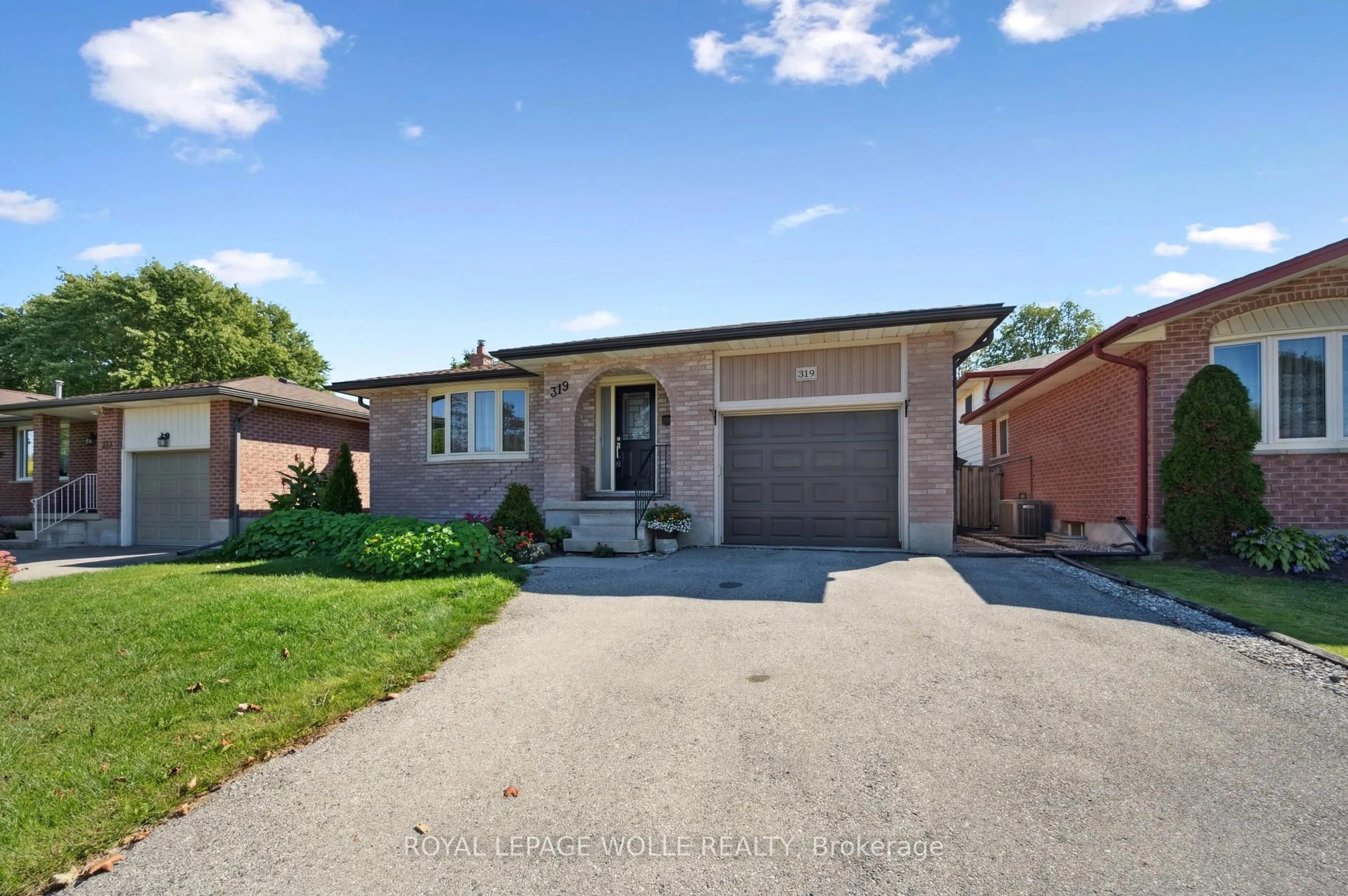 Home with brick exterior material, street for 319 Conservation Dr, Waterloo Ontario N2V 1V2