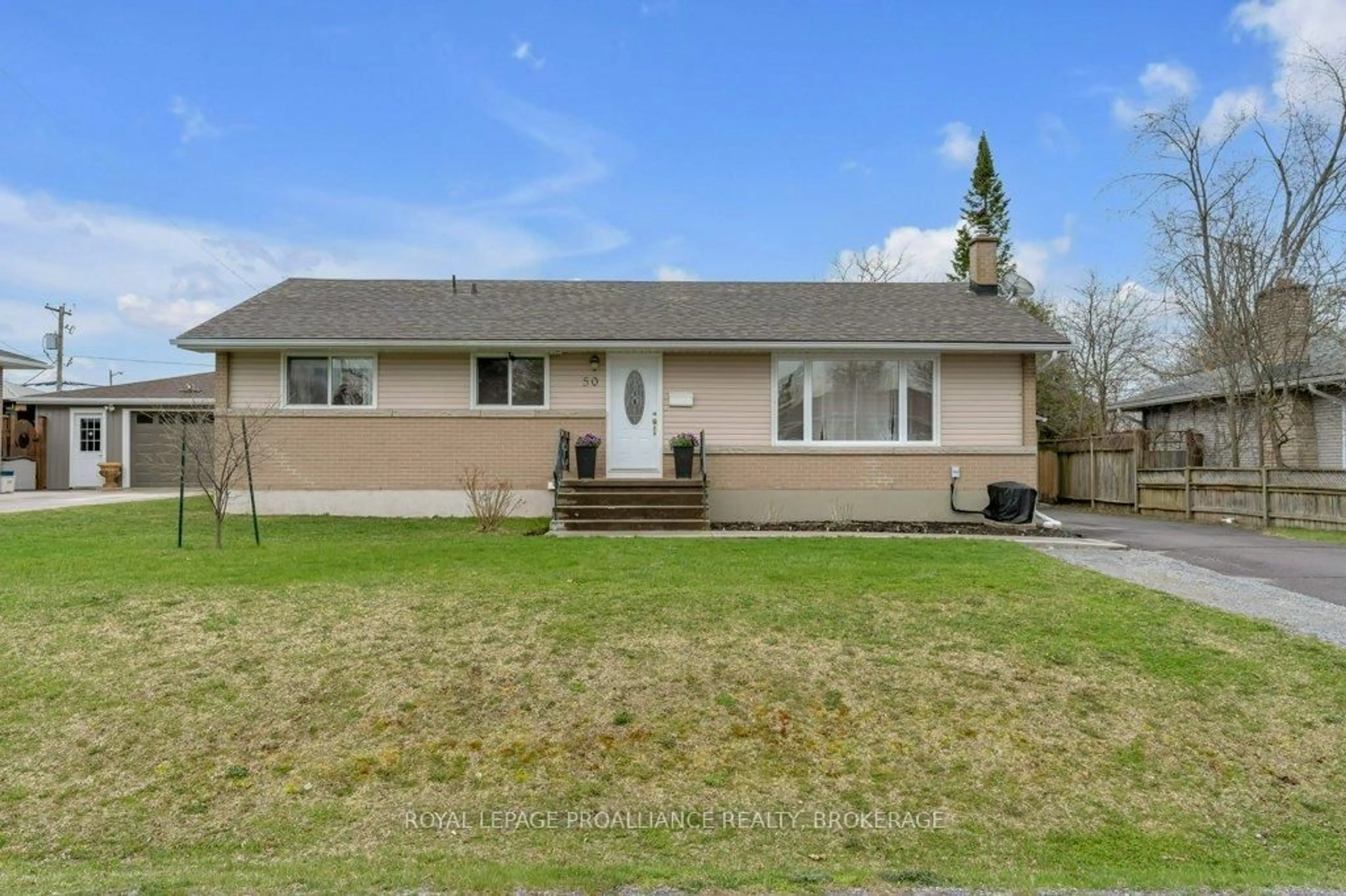 Home with vinyl exterior material, street for 50 Princeton Pl, Loyalist Ontario K7N 1E6
