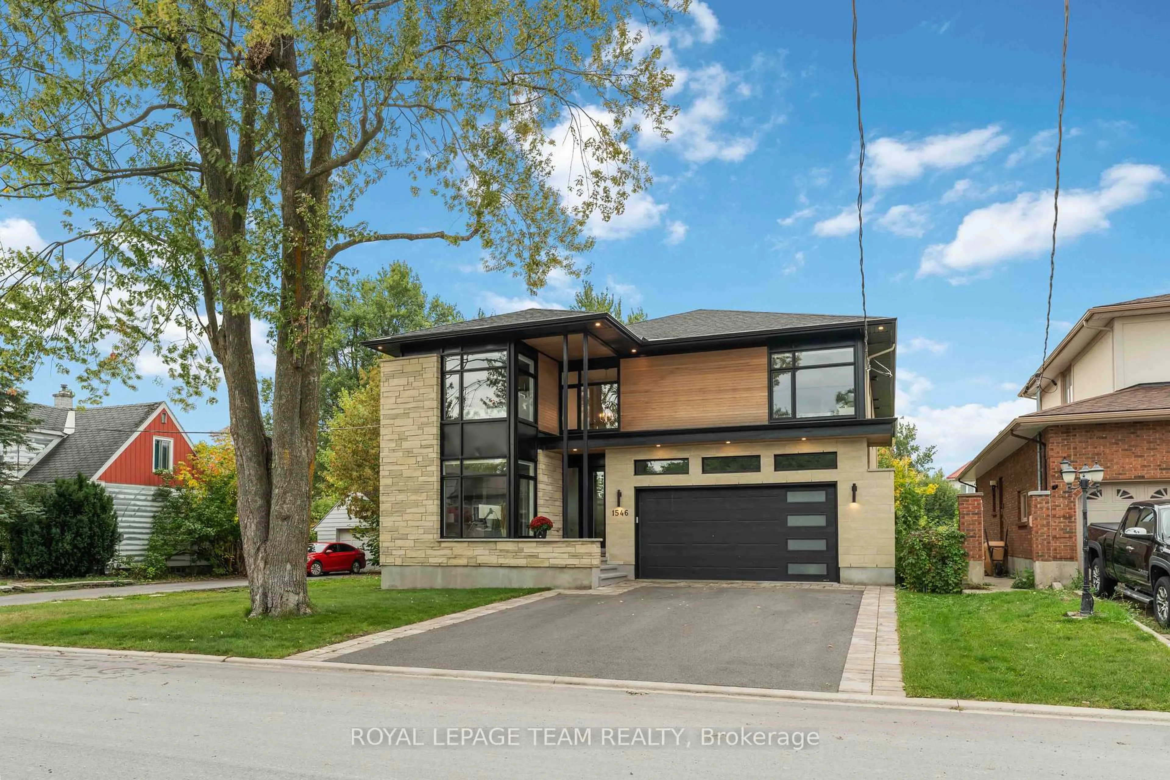 Home with brick exterior material, street for 1546 Claymor Ave, Ottawa Ontario K2C 1T1
