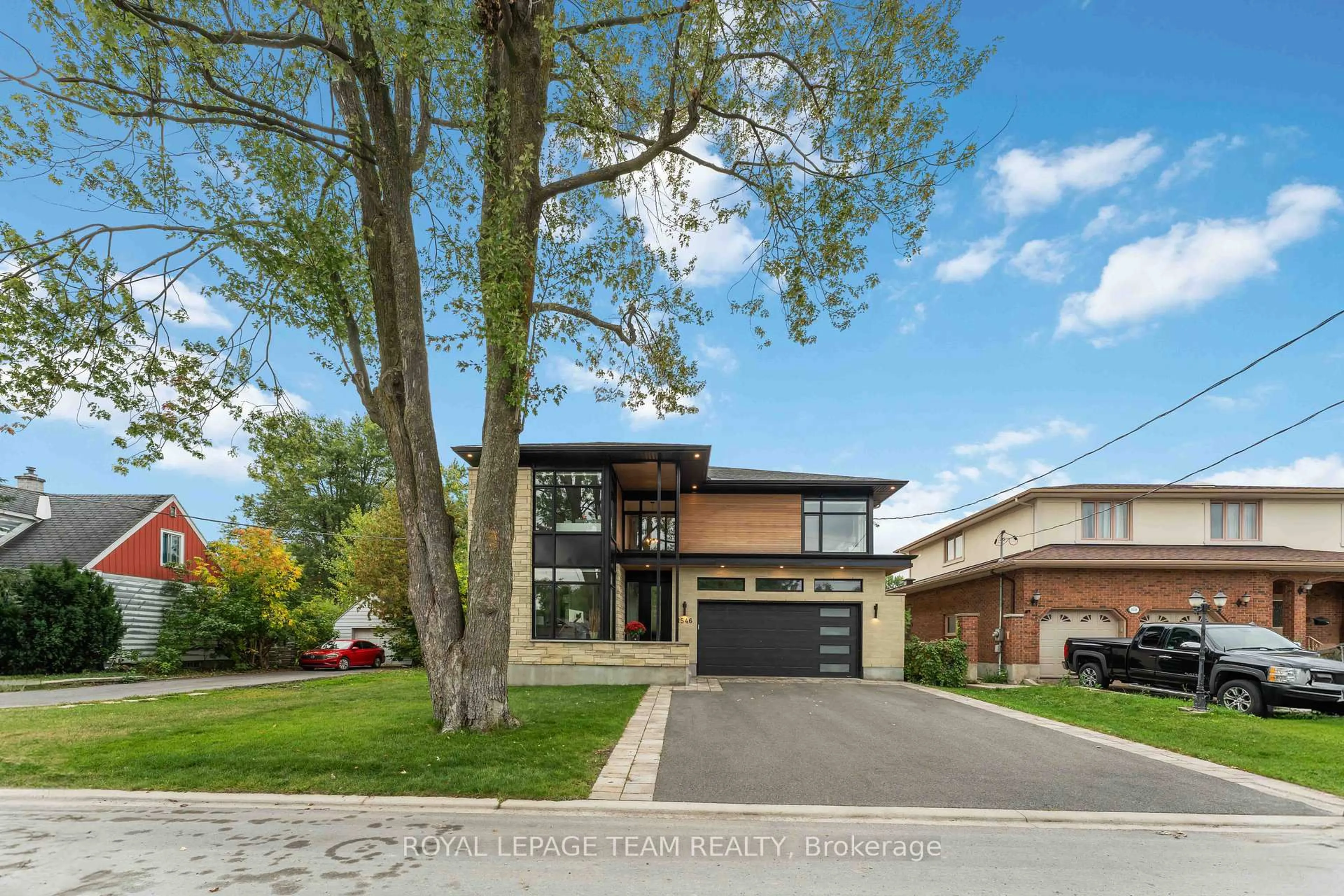 Home with brick exterior material, street for 1546 Claymor Ave, Ottawa Ontario K2C 1T1