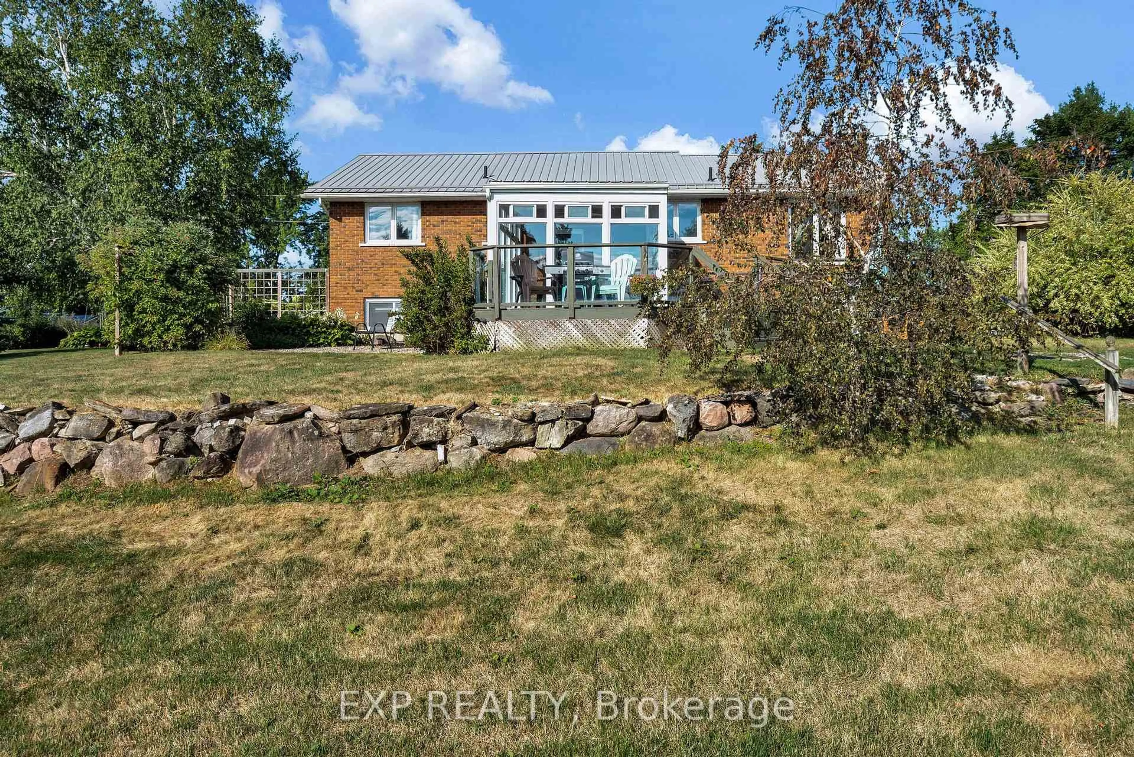 A pic from outside/outdoor area/front of a property/back of a property/a pic from drone, water/lake/river/ocean view for 112 Stoco Rd, Tweed Ontario K0K 3J0