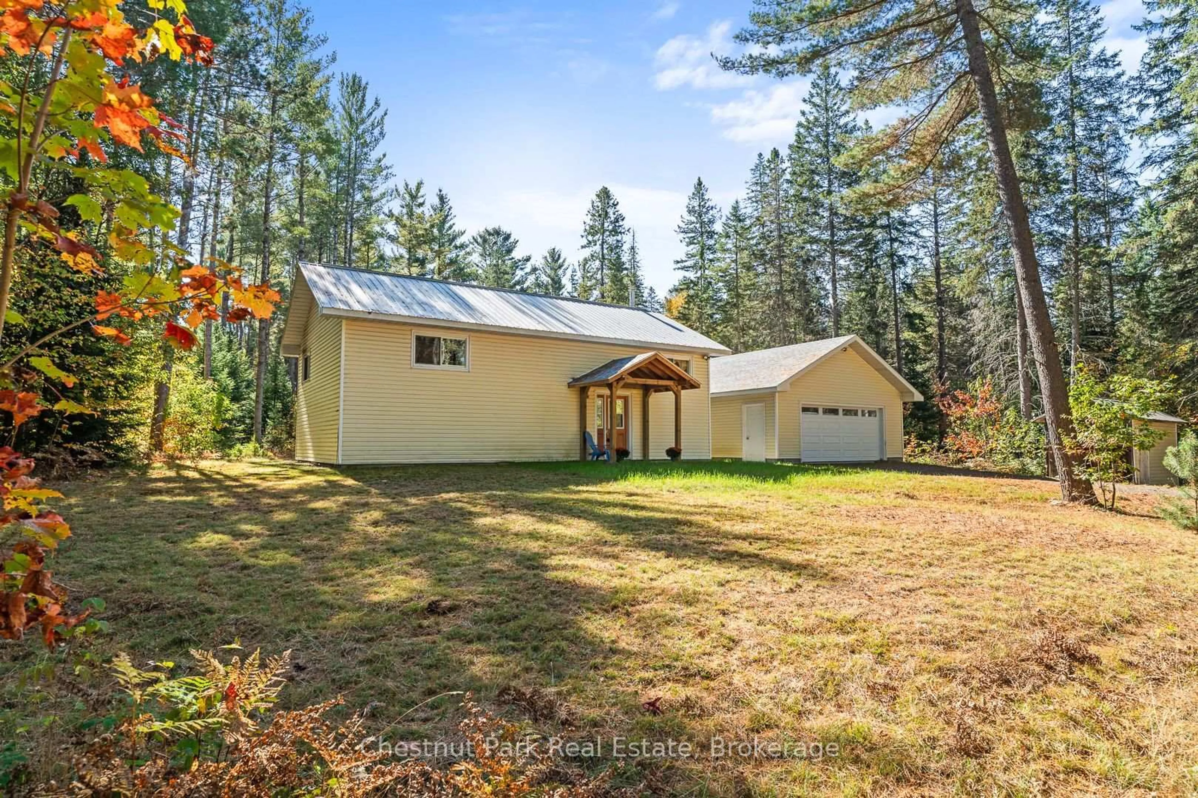 A pic from outside/outdoor area/front of a property/back of a property/a pic from drone, forest/trees view for 2830 Etwell Rd, Huntsville Ontario P1H 2J2