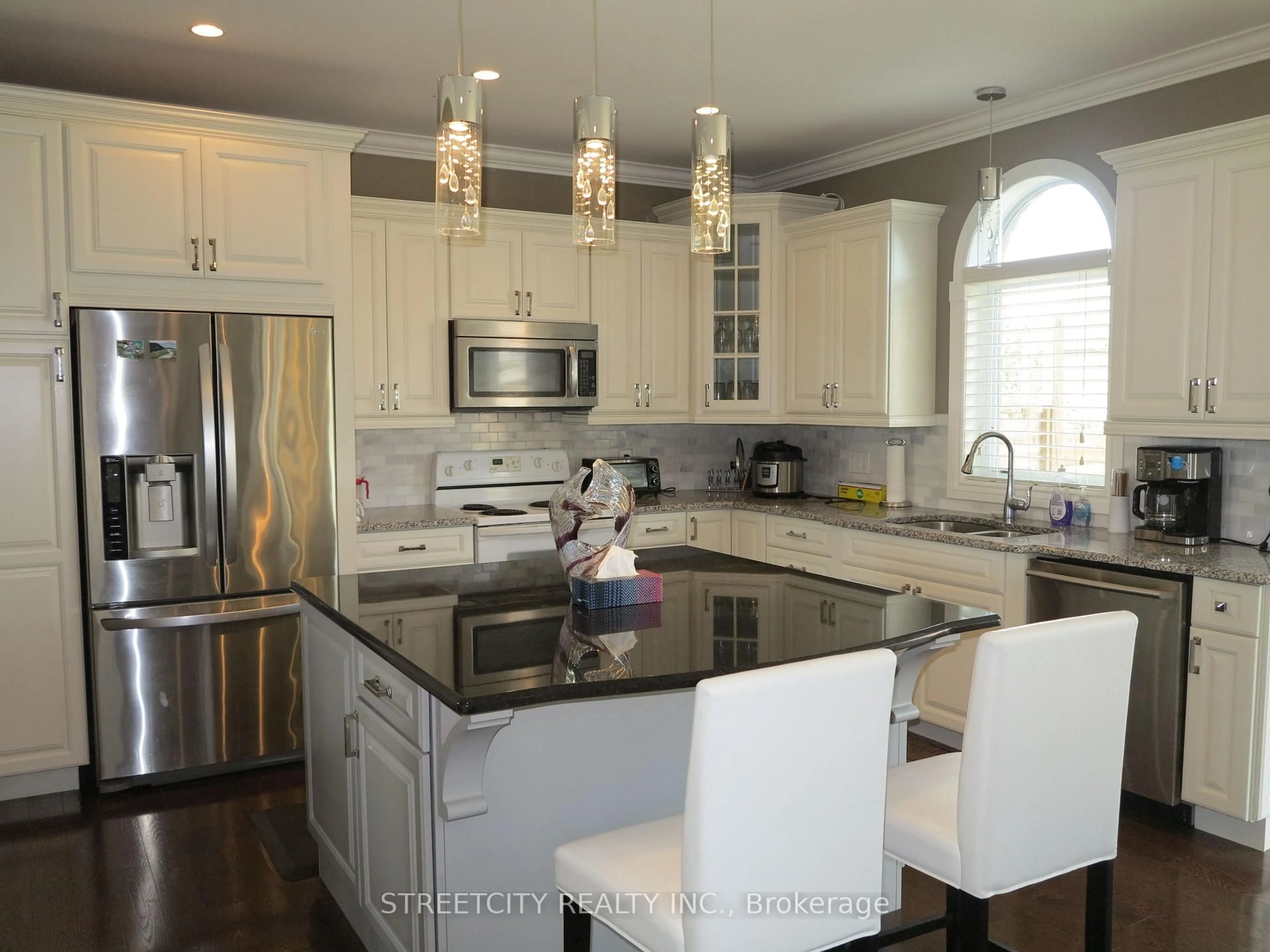 Open concept kitchen, ceramic/tile floor for 1939 BALLYMOTE Ave, London North Ontario N5X 0J6