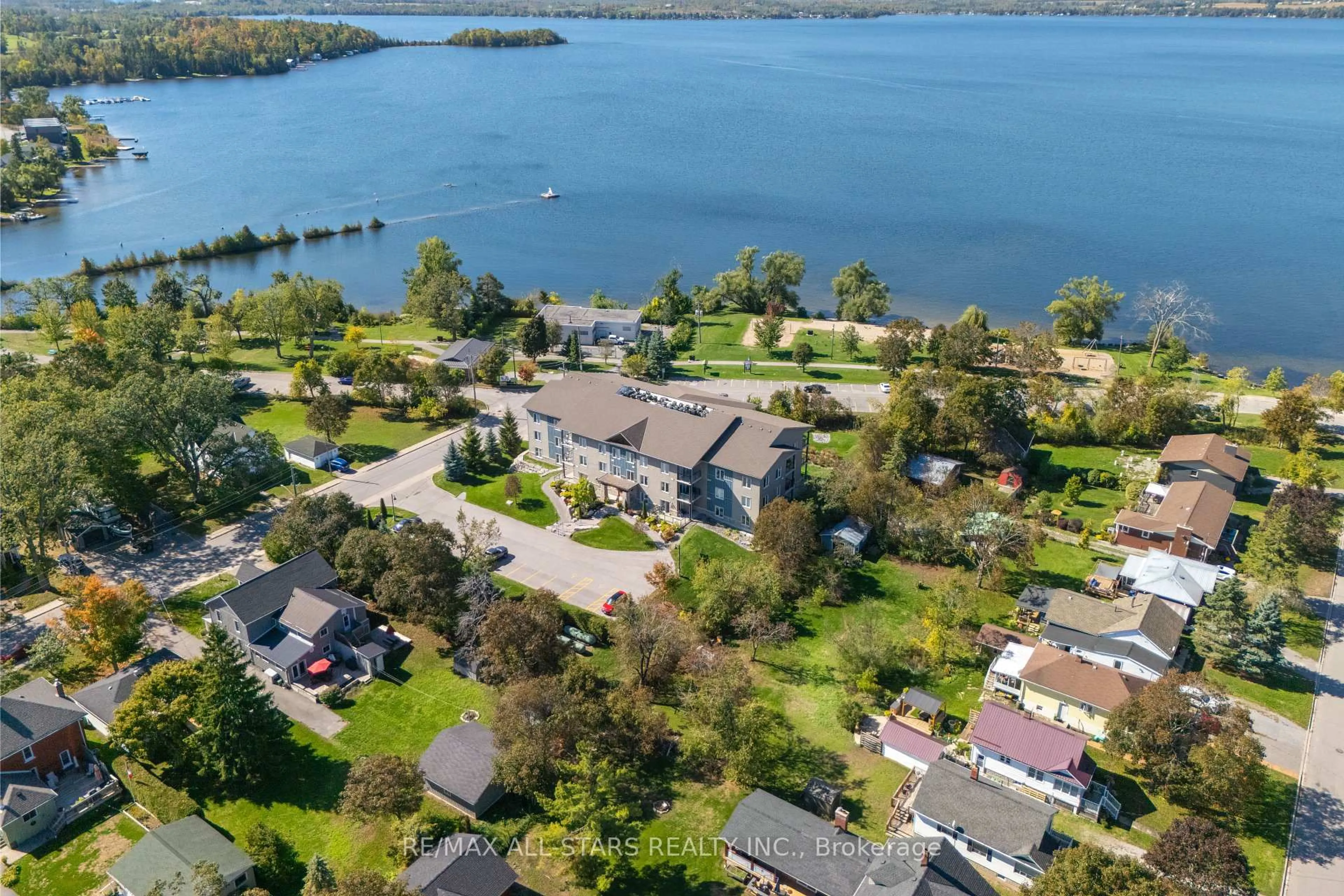 A pic from outside/outdoor area/front of a property/back of a property/a pic from drone, water/lake/river/ocean view for 94 Francis St #308, Kawartha Lakes Ontario K0M 1N0