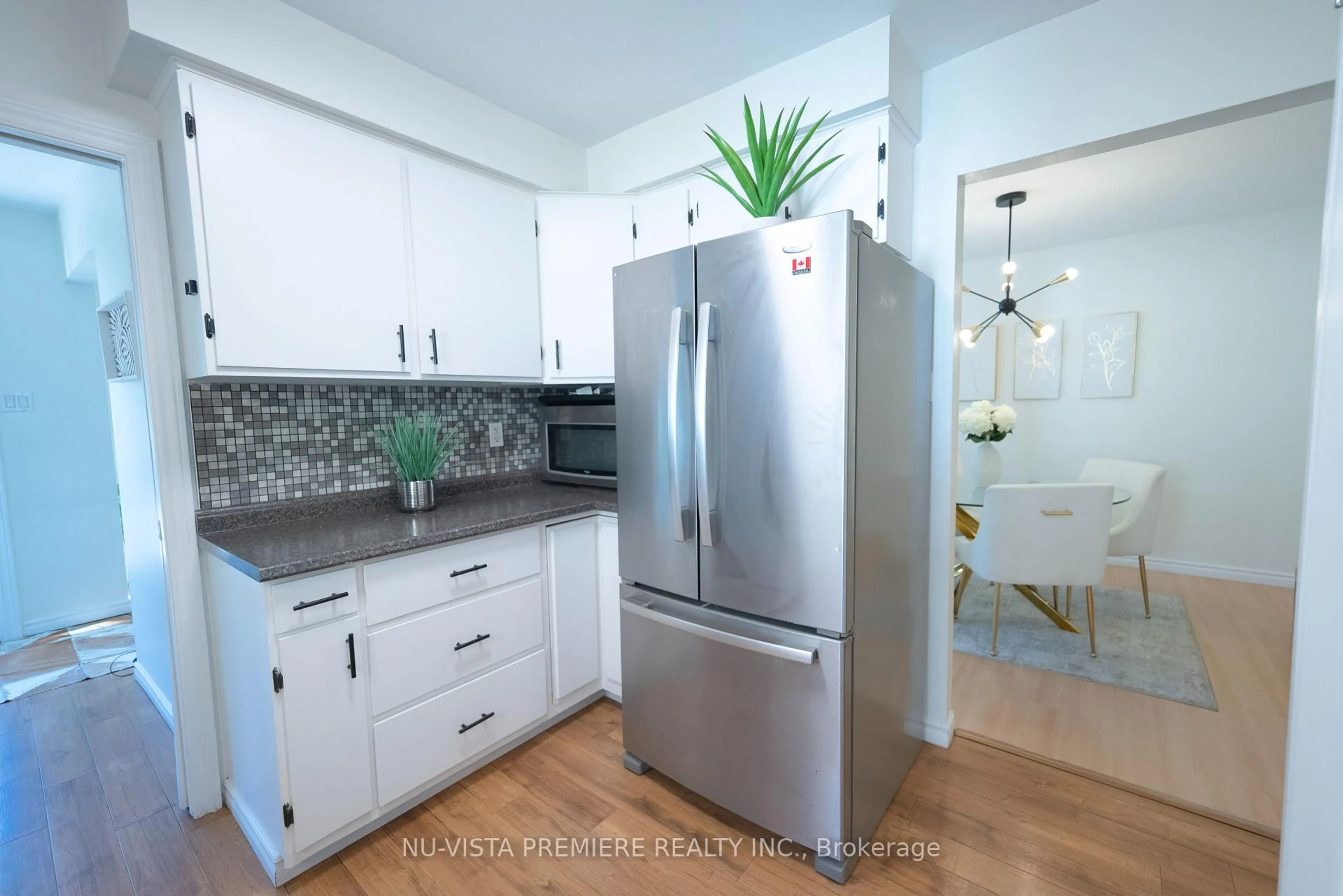 Contemporary kitchen, ceramic/tile floor for 103 Scotchmere Cres, London South Ontario N6E 1Z9