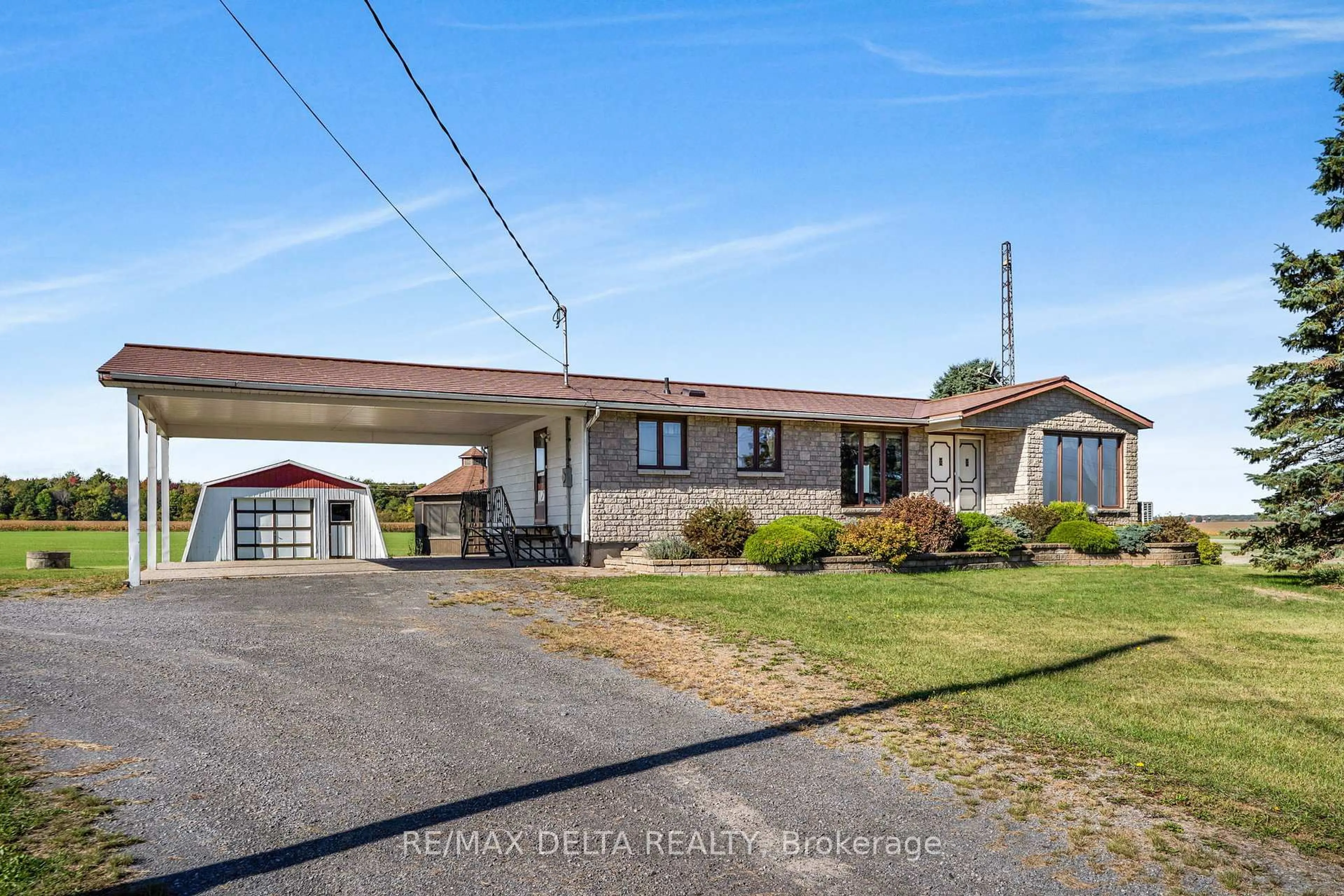 A pic from outside/outdoor area/front of a property/back of a property/a pic from drone, street for 2894 County Road 9 Rd, The Nation Ontario K0B 1G0