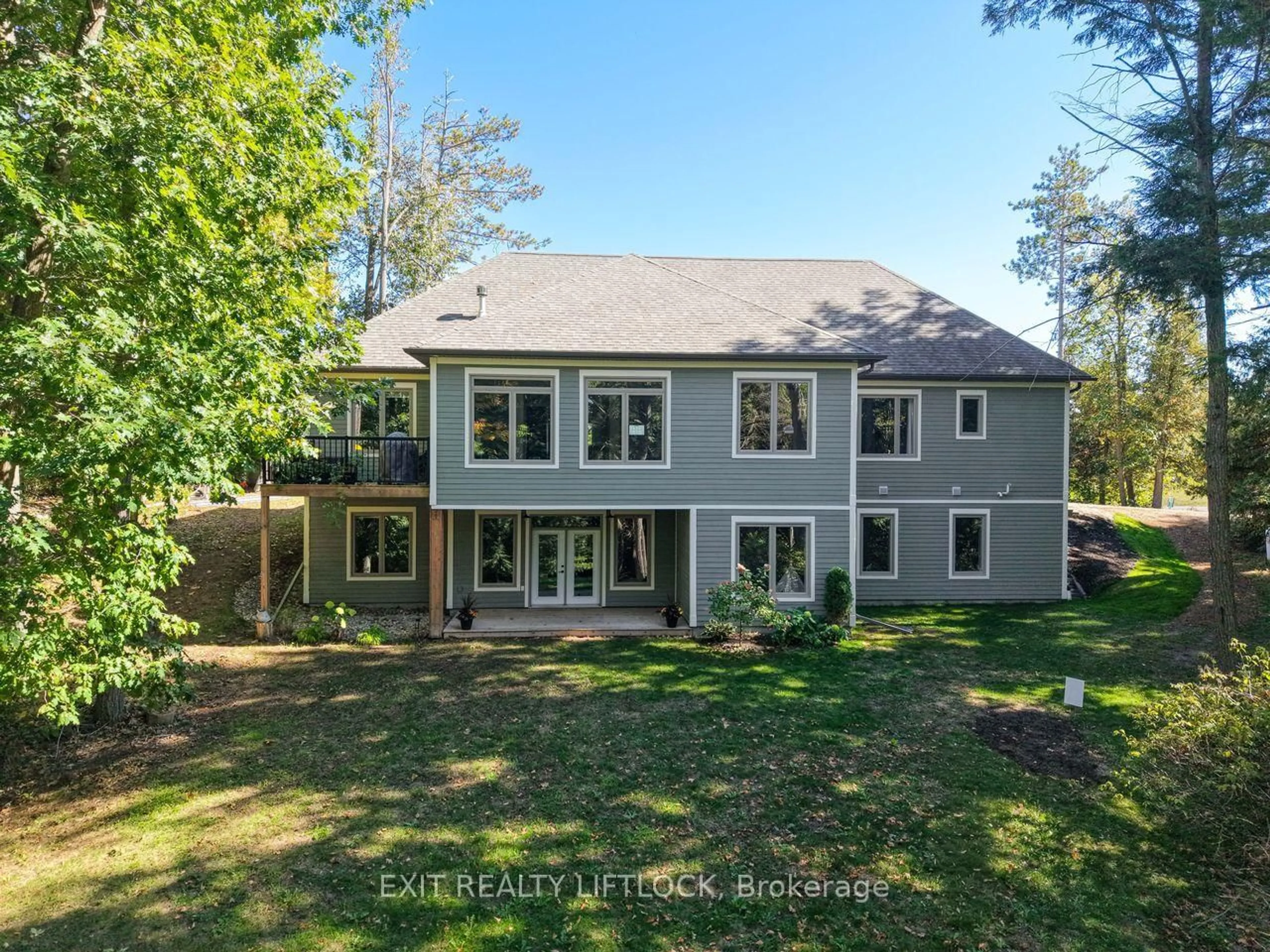 A pic from outside/outdoor area/front of a property/back of a property/a pic from drone, unknown for 404 County Road 4, Douro-Dummer Ontario K9J 6Y1