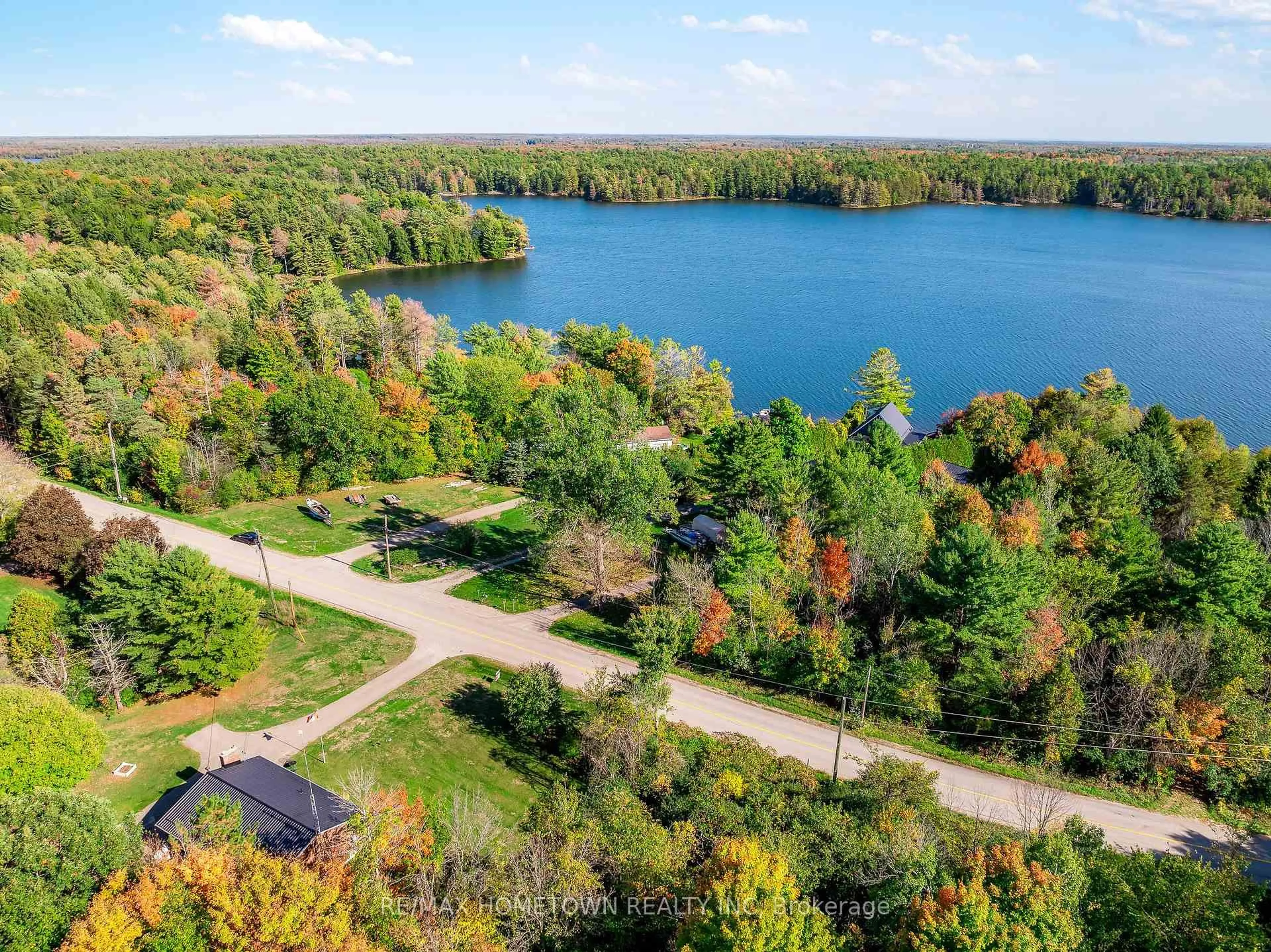 A pic from outside/outdoor area/front of a property/back of a property/a pic from drone, water/lake/river/ocean view for 114 Temperance Lake Rd, Athens Ontario K0E 1B0