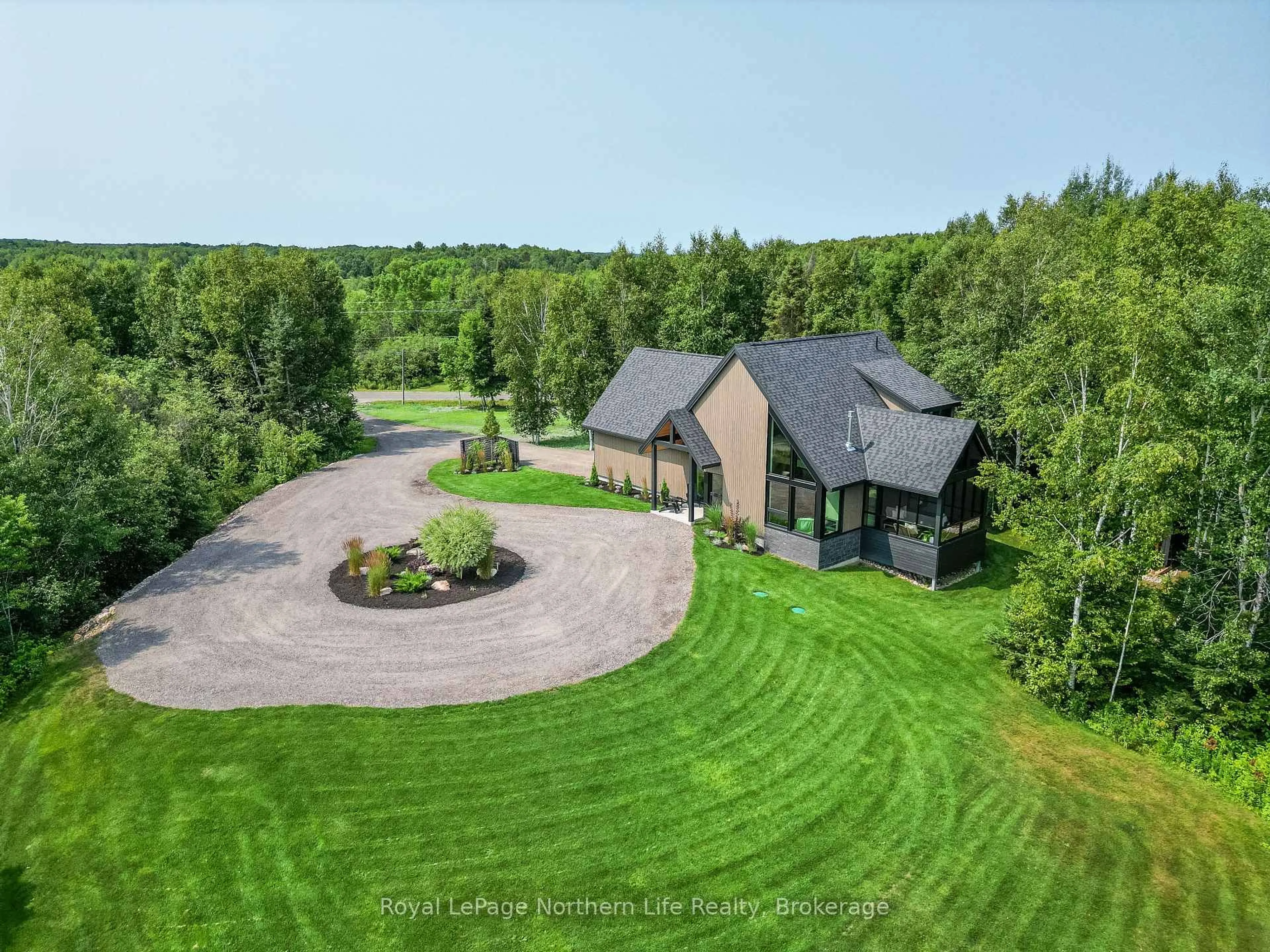 A pic from outside/outdoor area/front of a property/back of a property/a pic from drone, unknown for 466 Ouellette Rd, East Ferris Ontario P0H 1K0