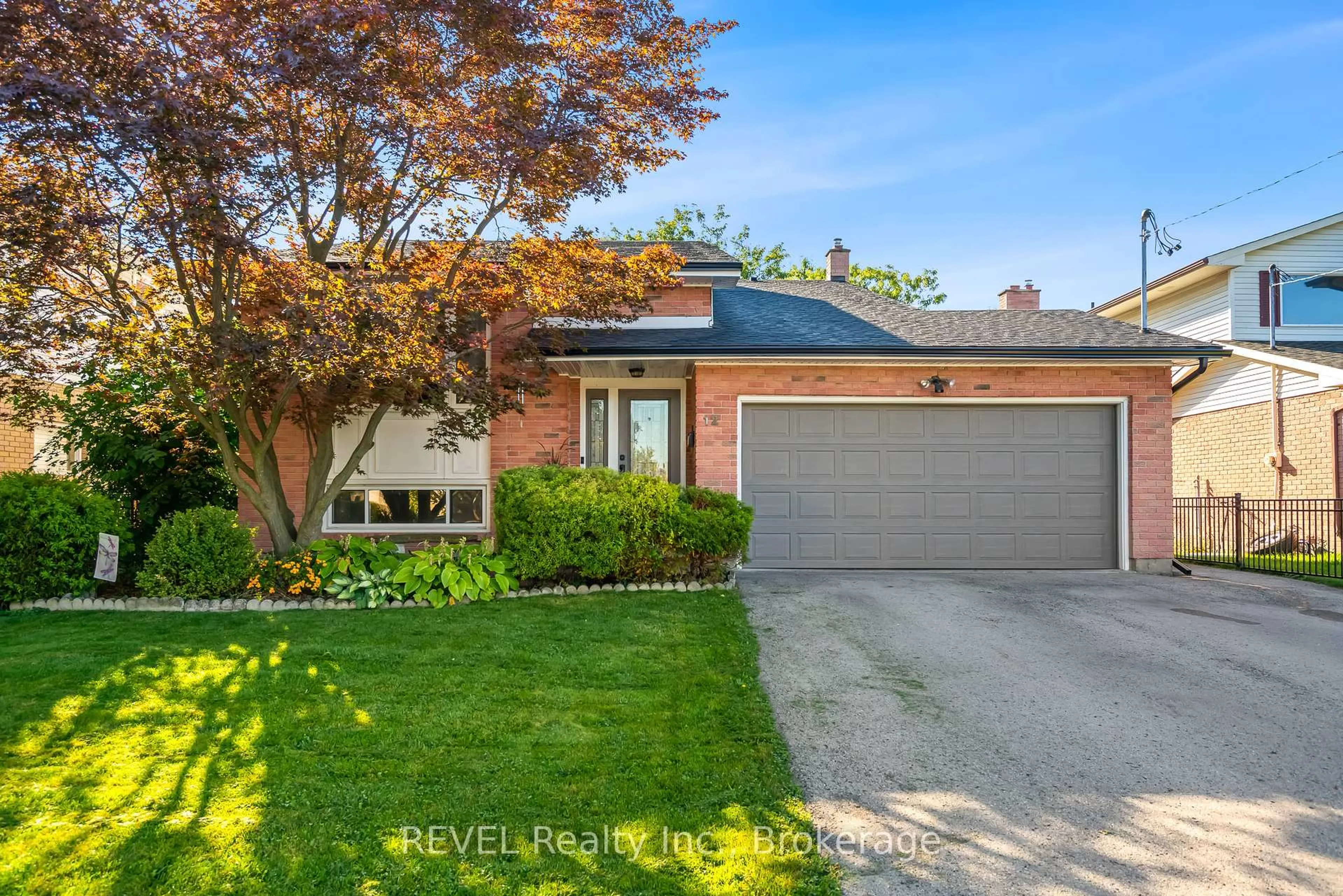Home with brick exterior material, street for 12 Silverdale Dr, St. Catharines Ontario L2M 3N1