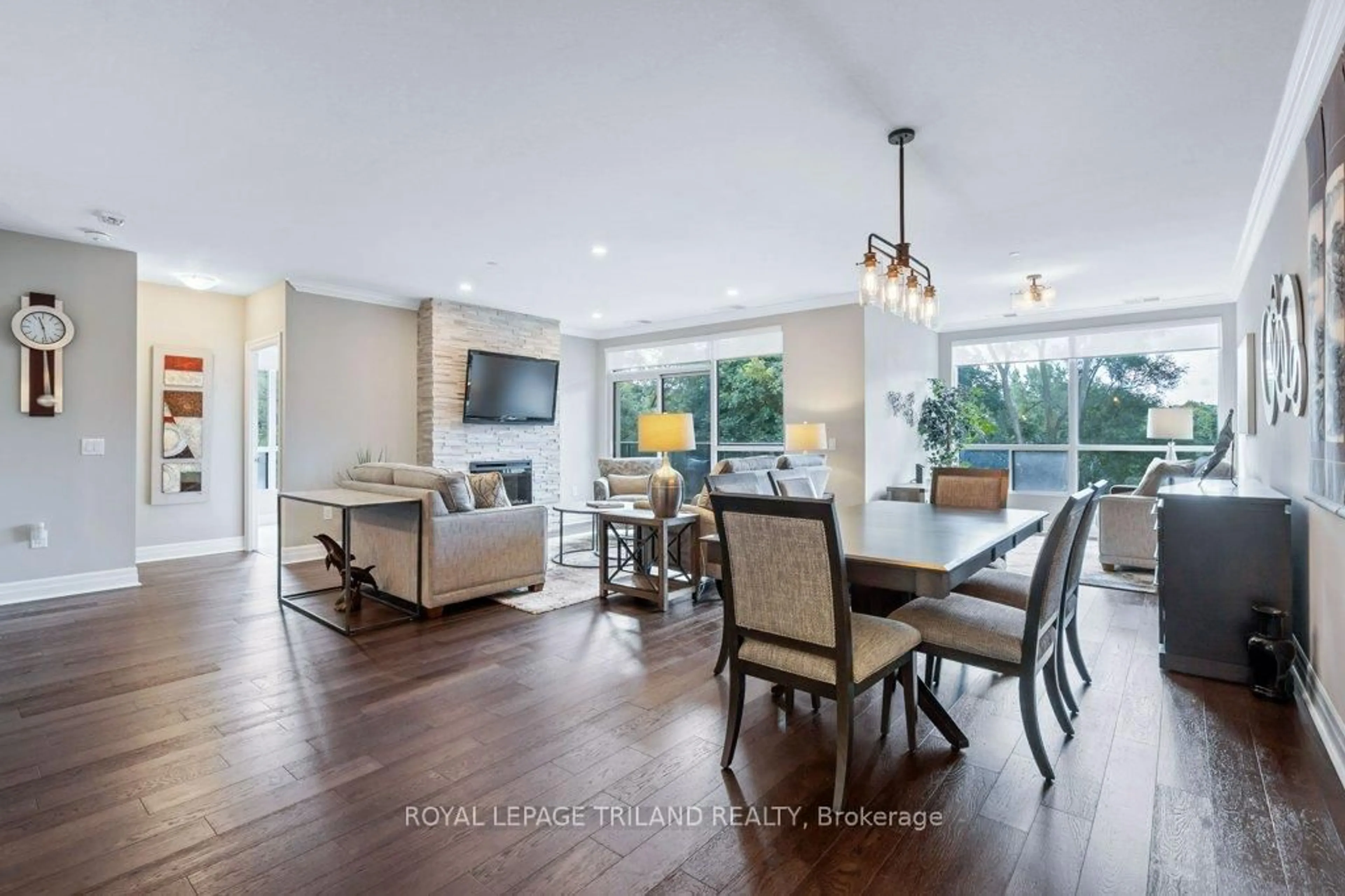 Open concept kitchen, wood/laminate floor for 1200 Commissioners Rd #504, London South Ontario N6K 1C7
