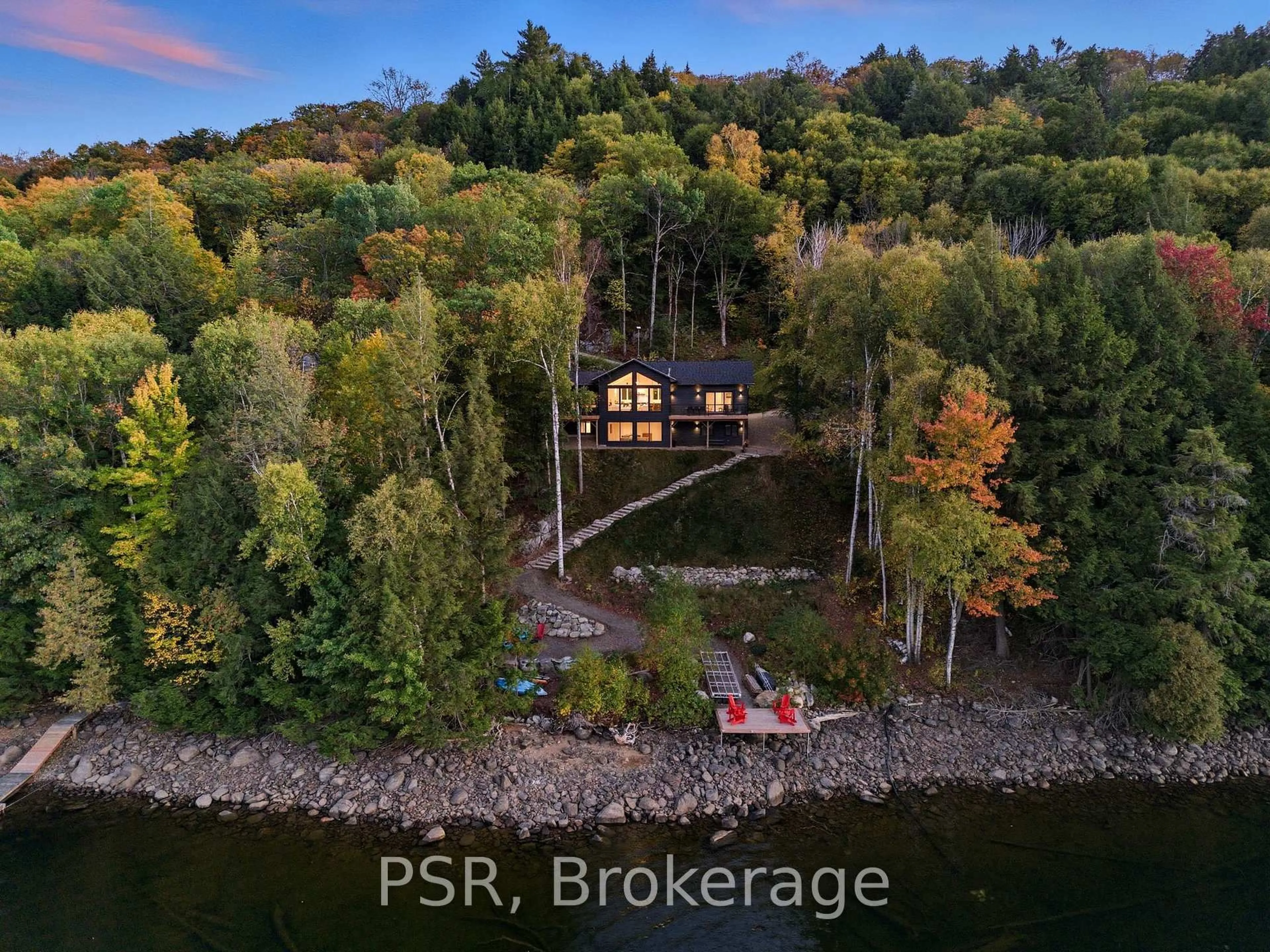 A pic from outside/outdoor area/front of a property/back of a property/a pic from drone, water/lake/river/ocean view for 1399 Baybreeze Lane, Dysart et al Ontario K0M 1S0