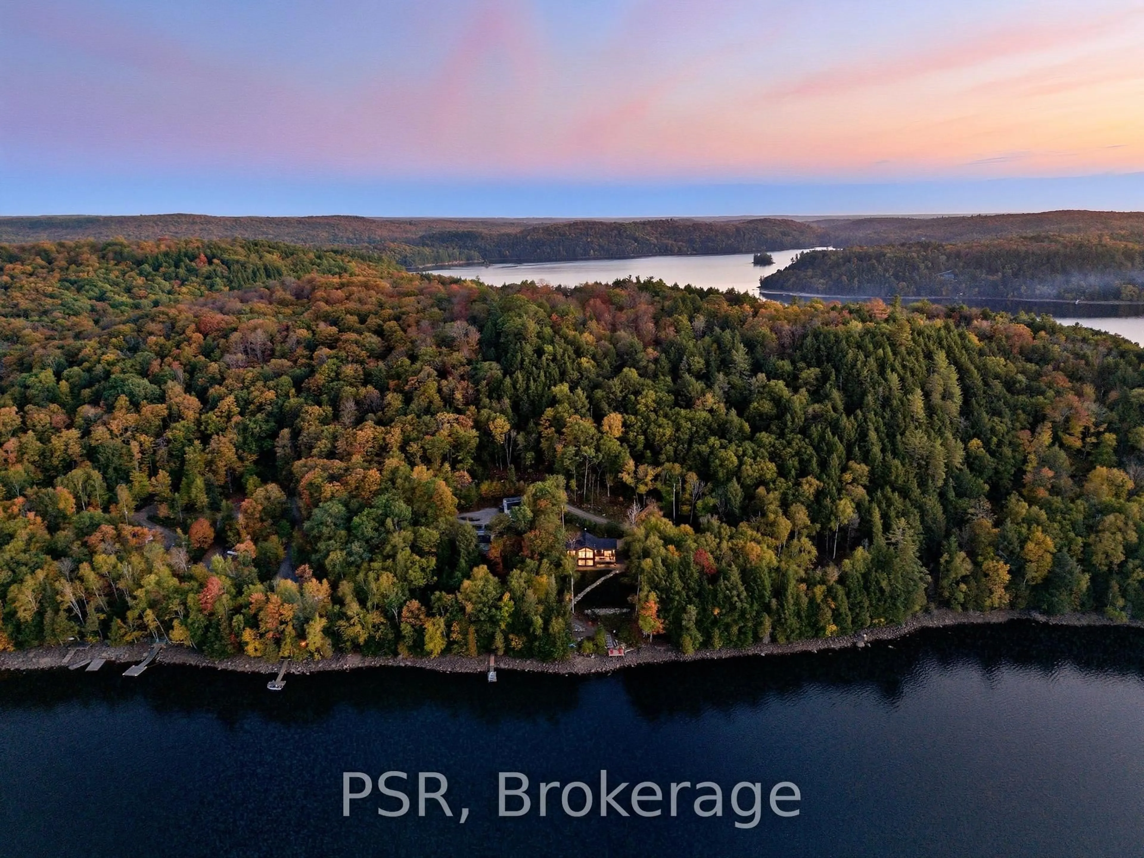 A pic from outside/outdoor area/front of a property/back of a property/a pic from drone, water/lake/river/ocean view for 1399 Baybreeze Lane, Dysart et al Ontario K0M 1S0