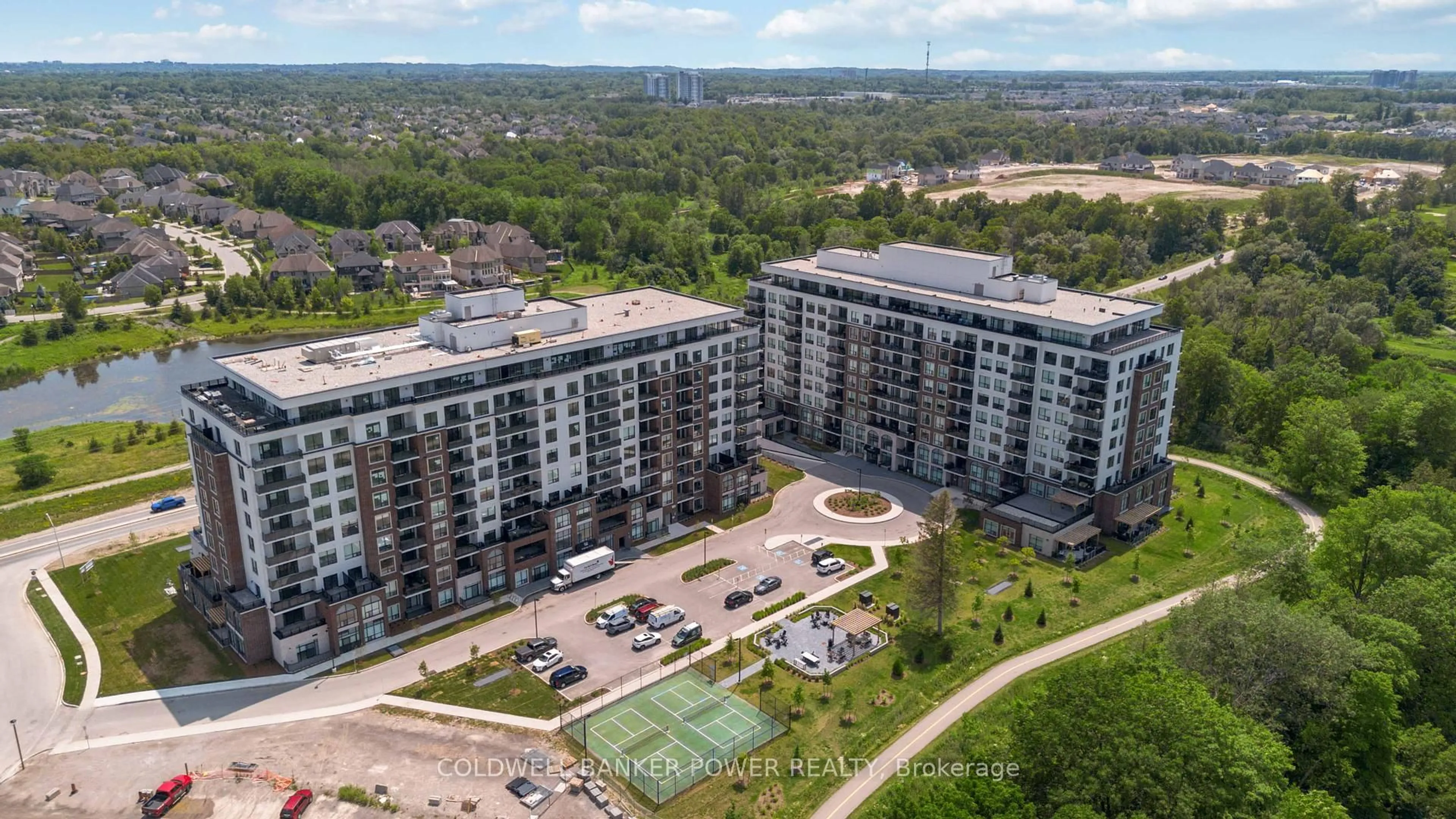 A pic from outside/outdoor area/front of a property/back of a property/a pic from drone, city buildings view from balcony for 480 Callaway Rd #105, London North Ontario N6G 0Z2