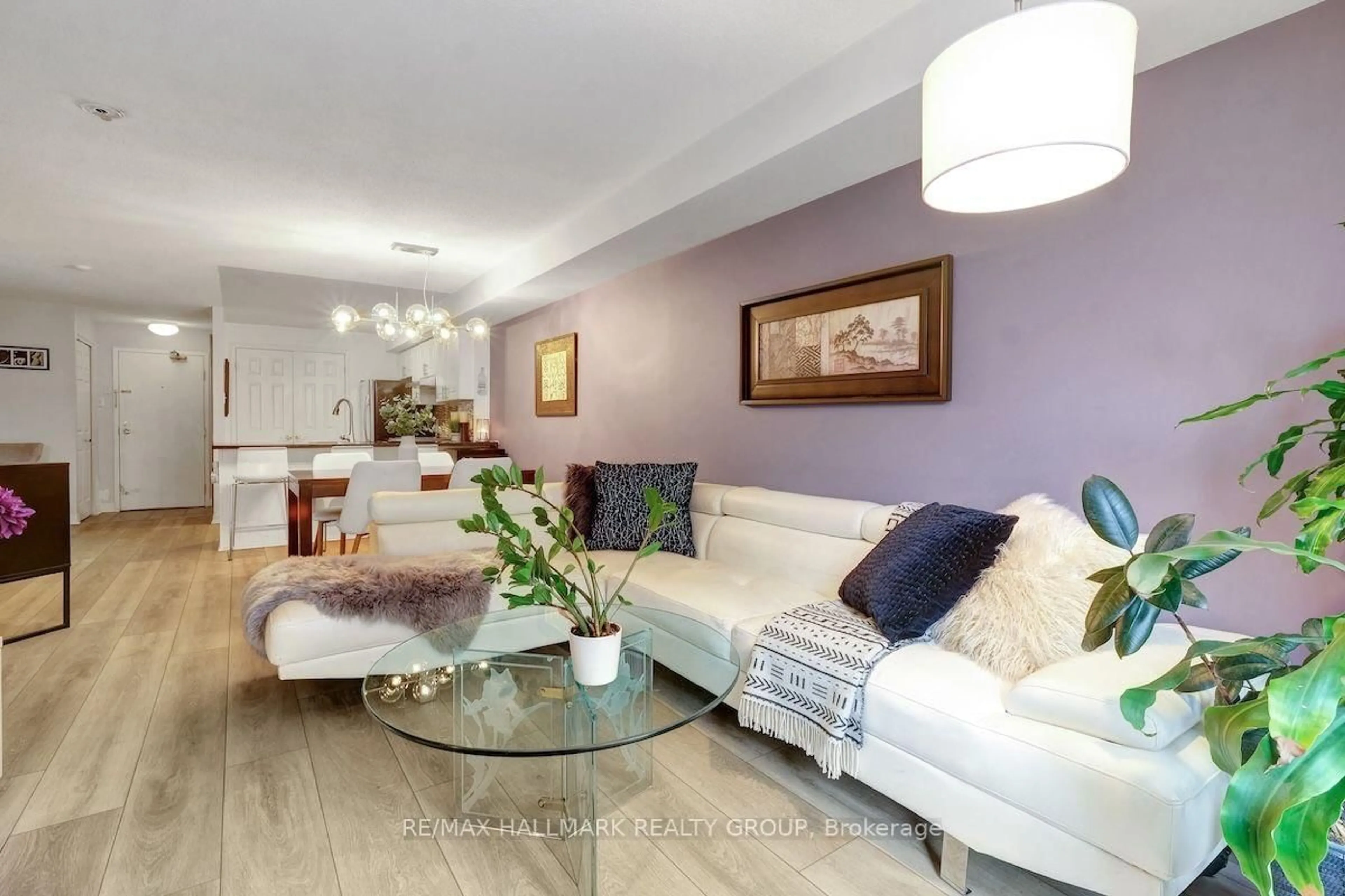 Living room with furniture, wood/laminate floor for 429 Somerset St #802, Ottawa Ontario K2P 2P5