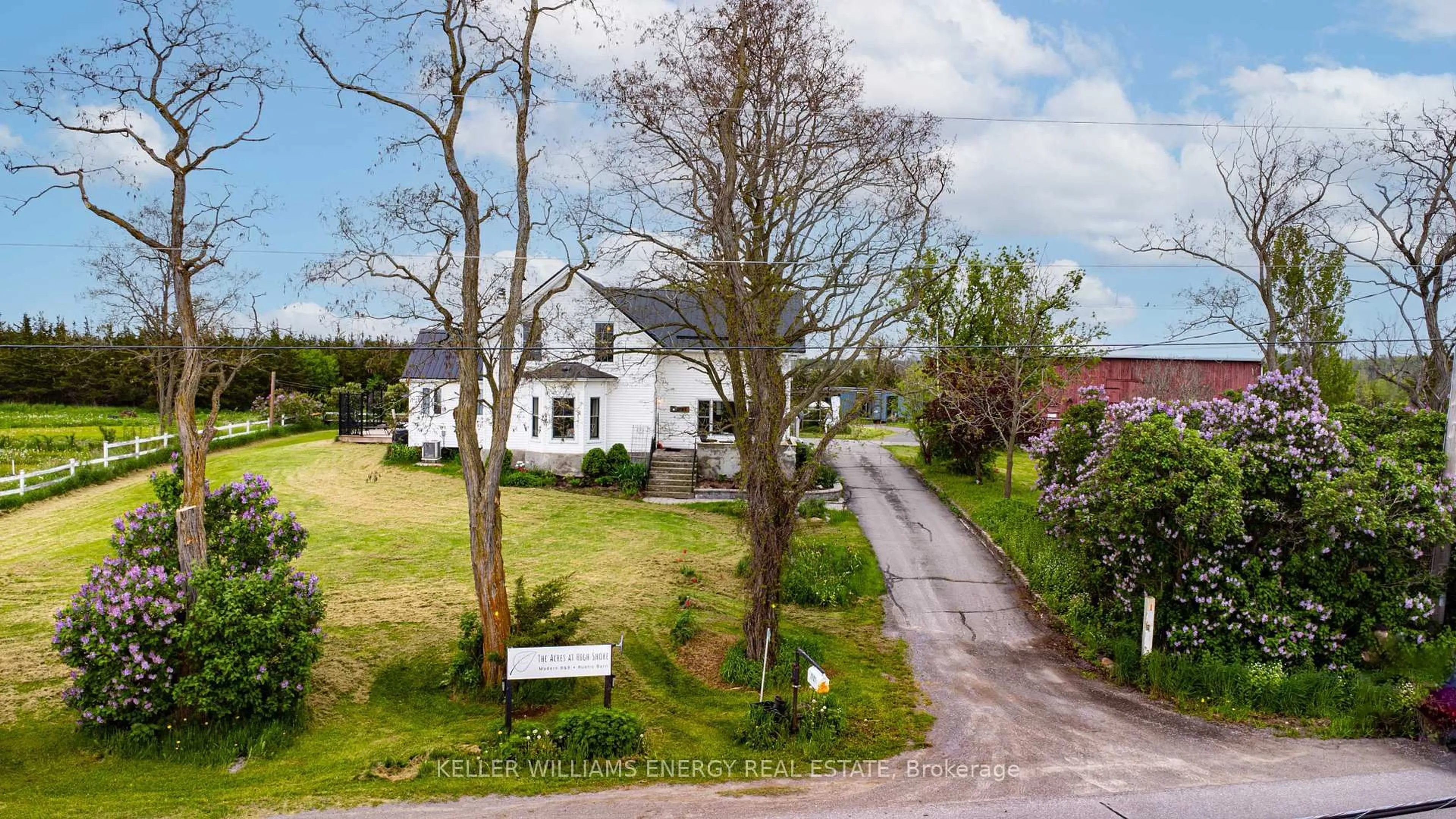 A pic from outside/outdoor area/front of a property/back of a property/a pic from drone, street for 1727 County Road 14 Rd, Prince Edward County Ontario K0K 1A0