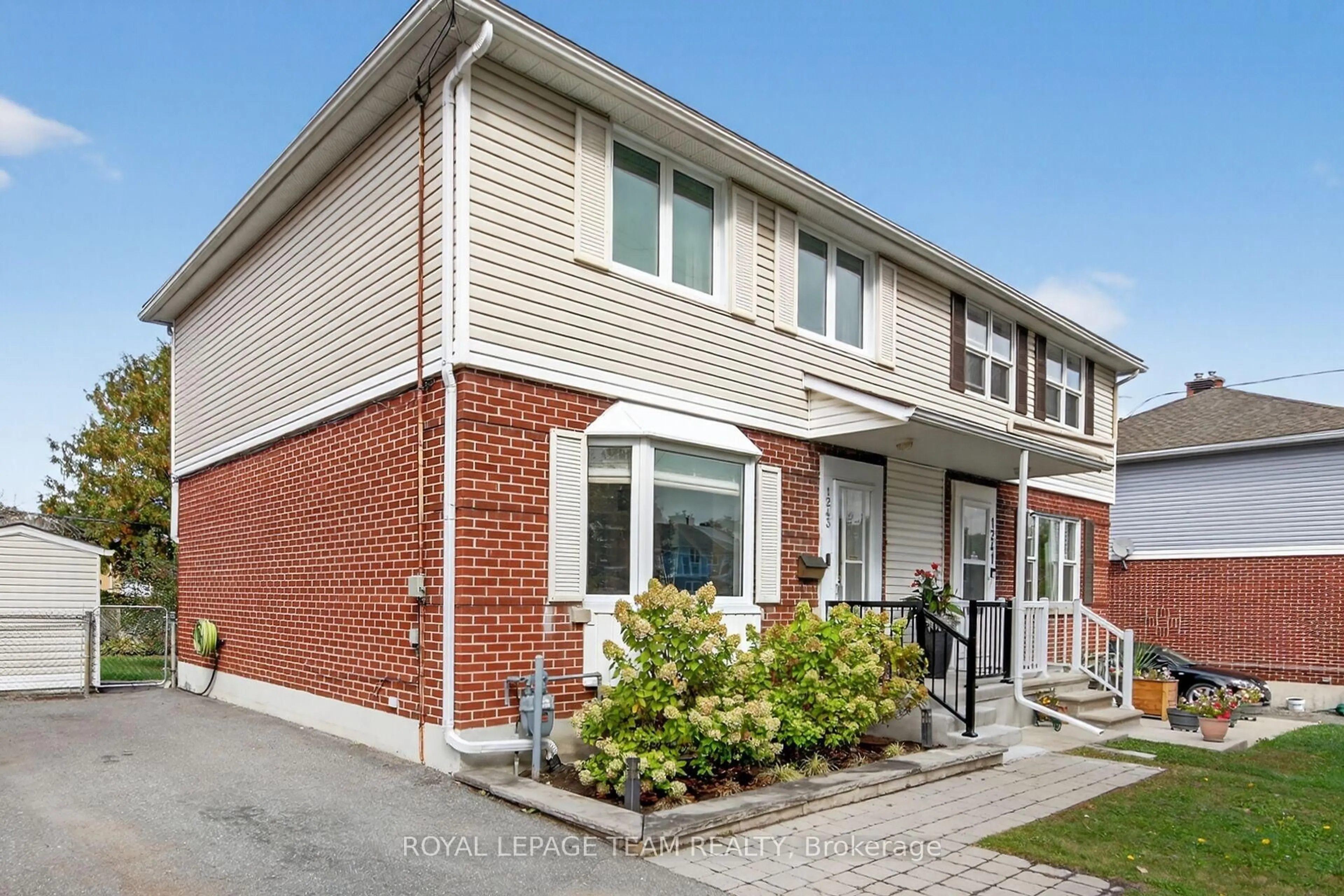 Home with brick exterior material, street for 1243 Kingston Ave, Ottawa Ontario K1Z 8K8
