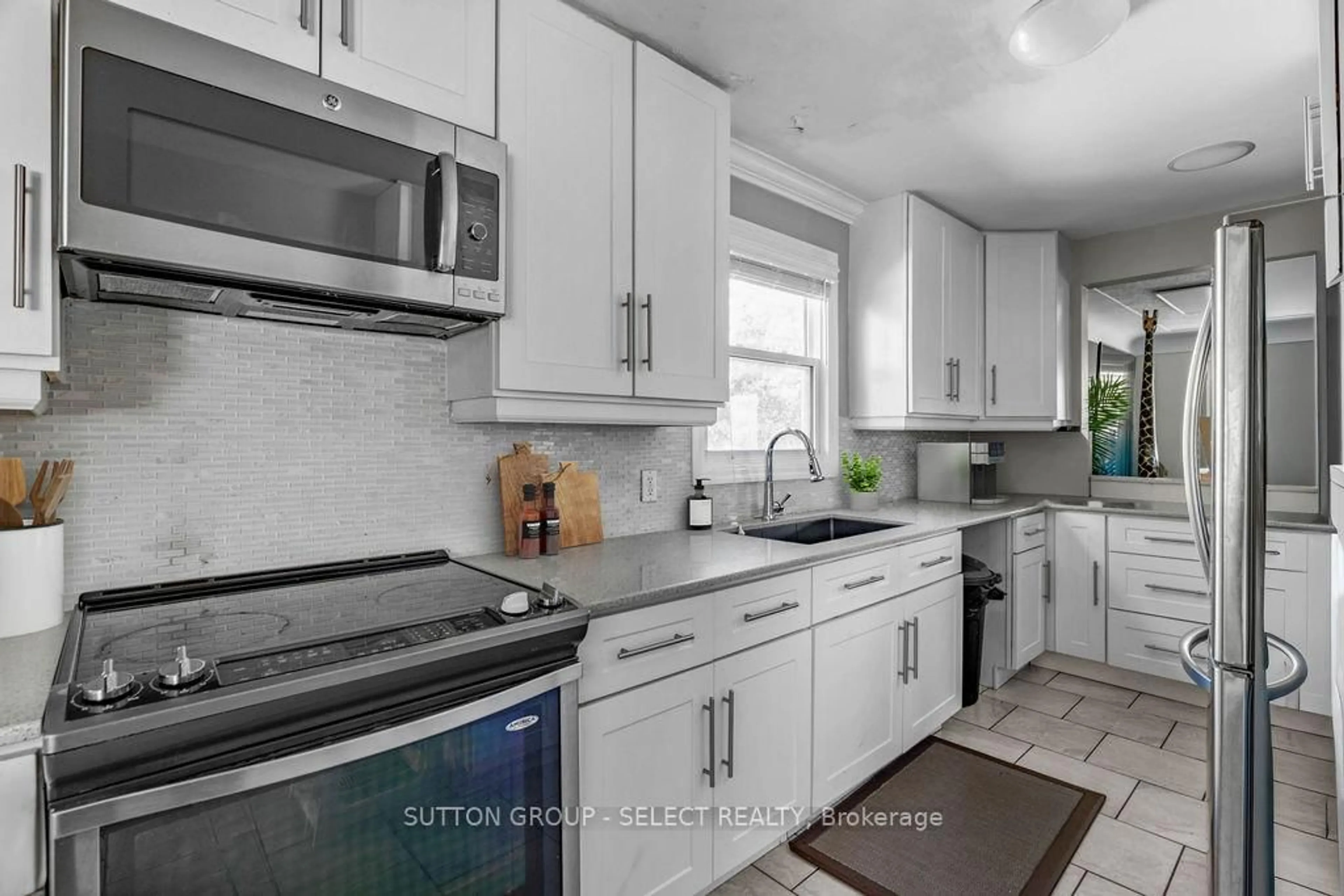 Open concept kitchen, ceramic/tile floor for 353 Clarke Rd, London East Ontario N5W 5G4