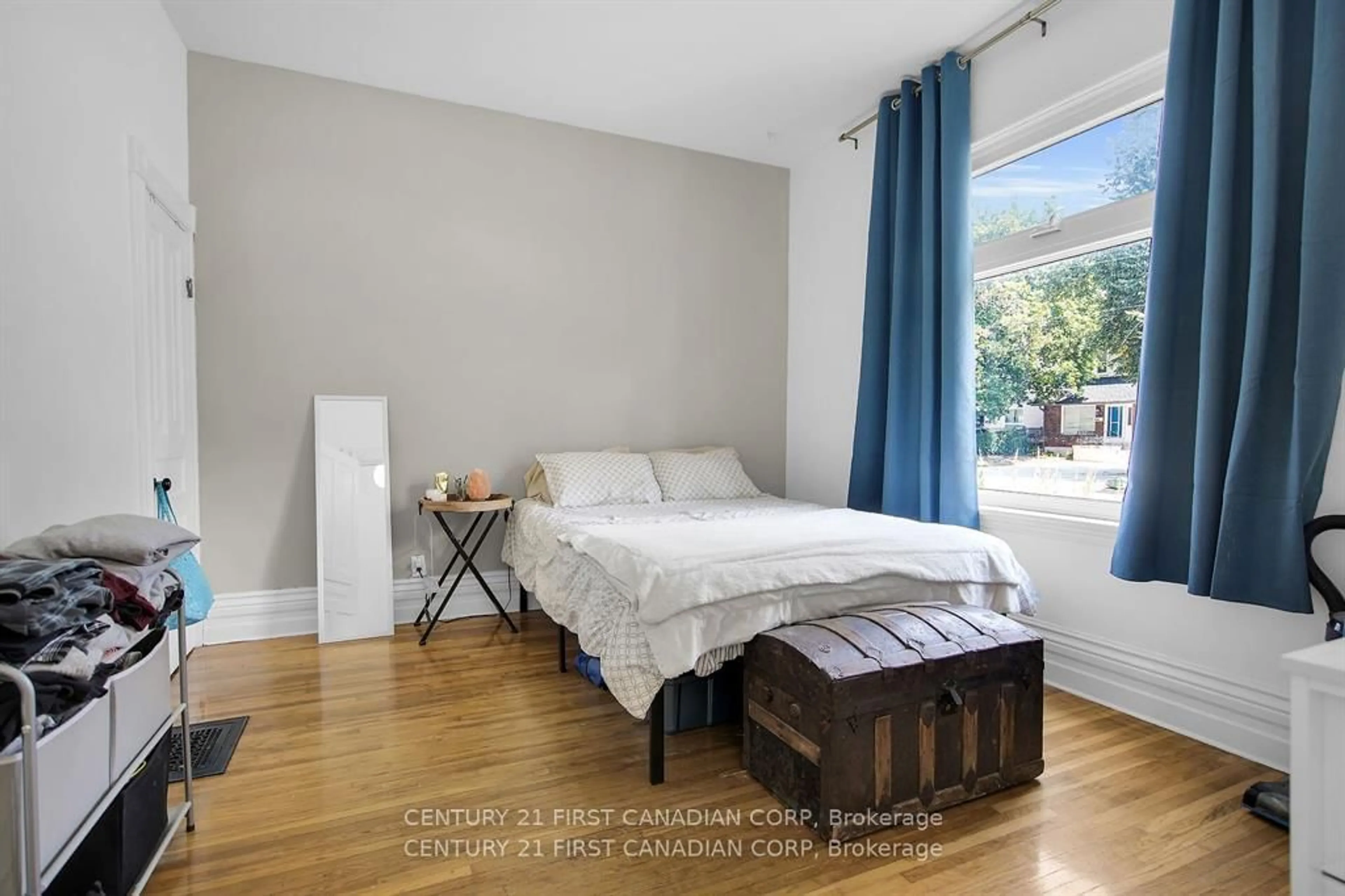 Bedroom with bed, wood/laminate floor for 453 Quebec St, London East Ontario N5W 3Y4