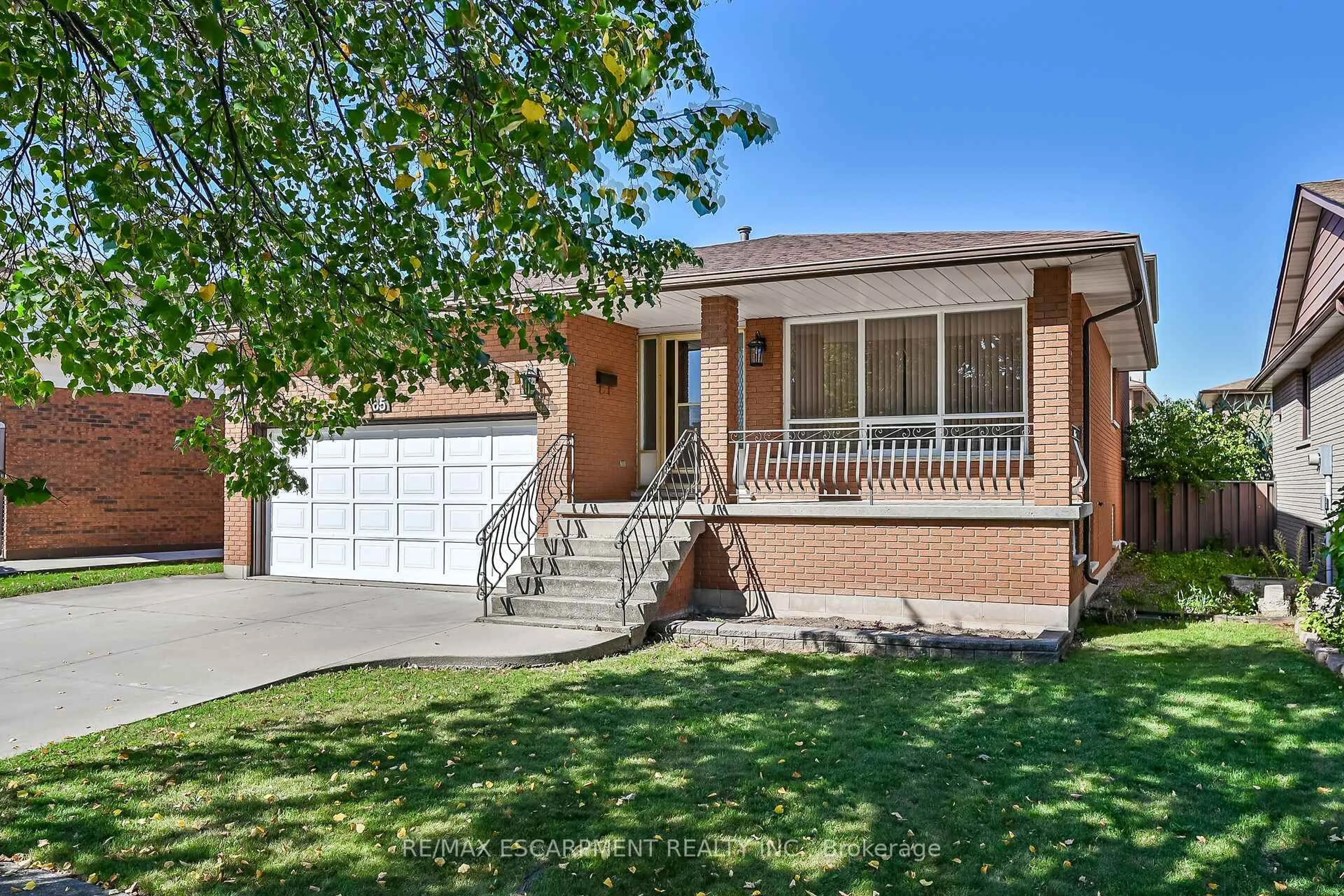 Home with brick exterior material, street for 65 Ellington Ave, Hamilton Ontario L8E 3T5