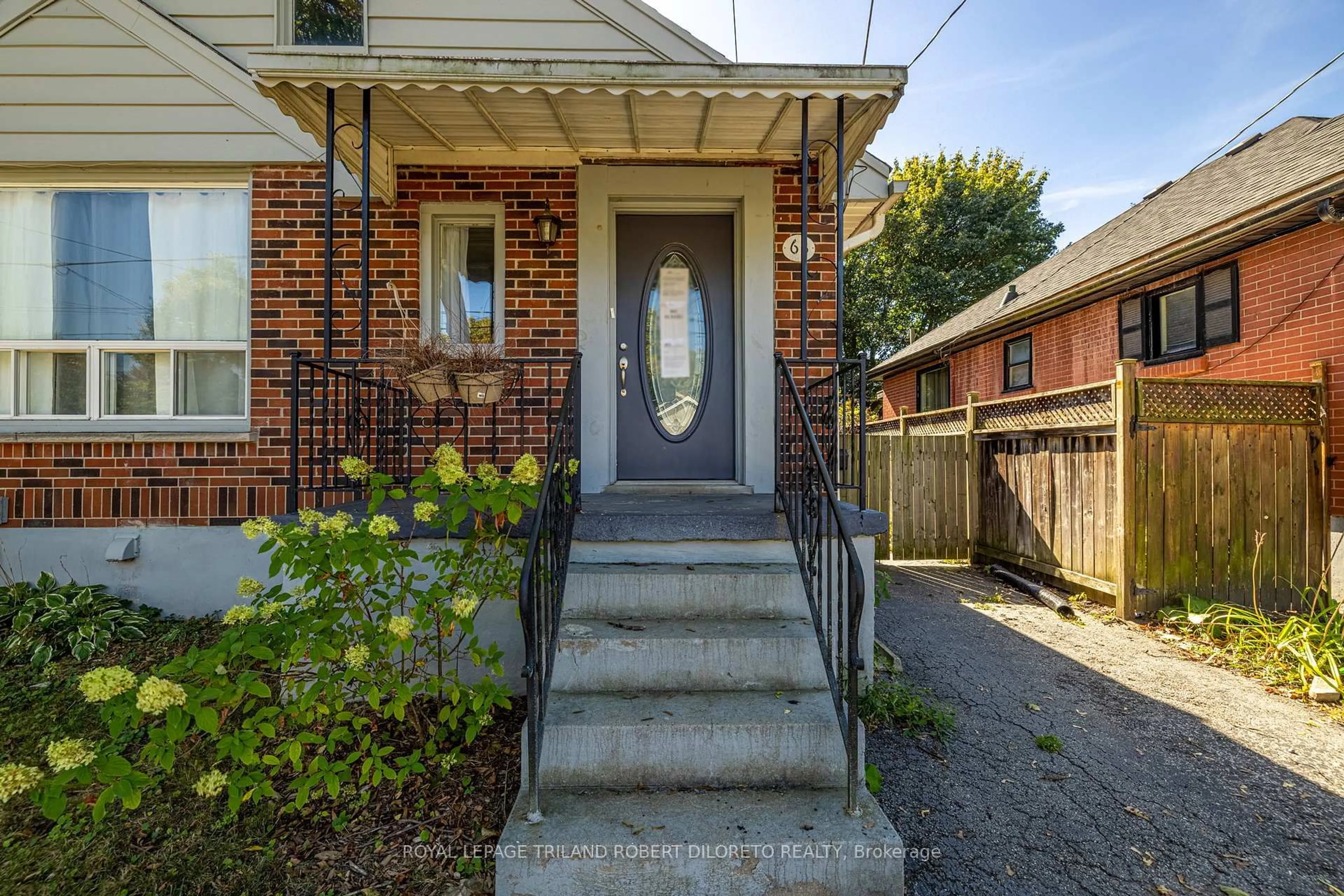 Home with brick exterior material, street for 63 Bond St, London South Ontario N6C 1W5