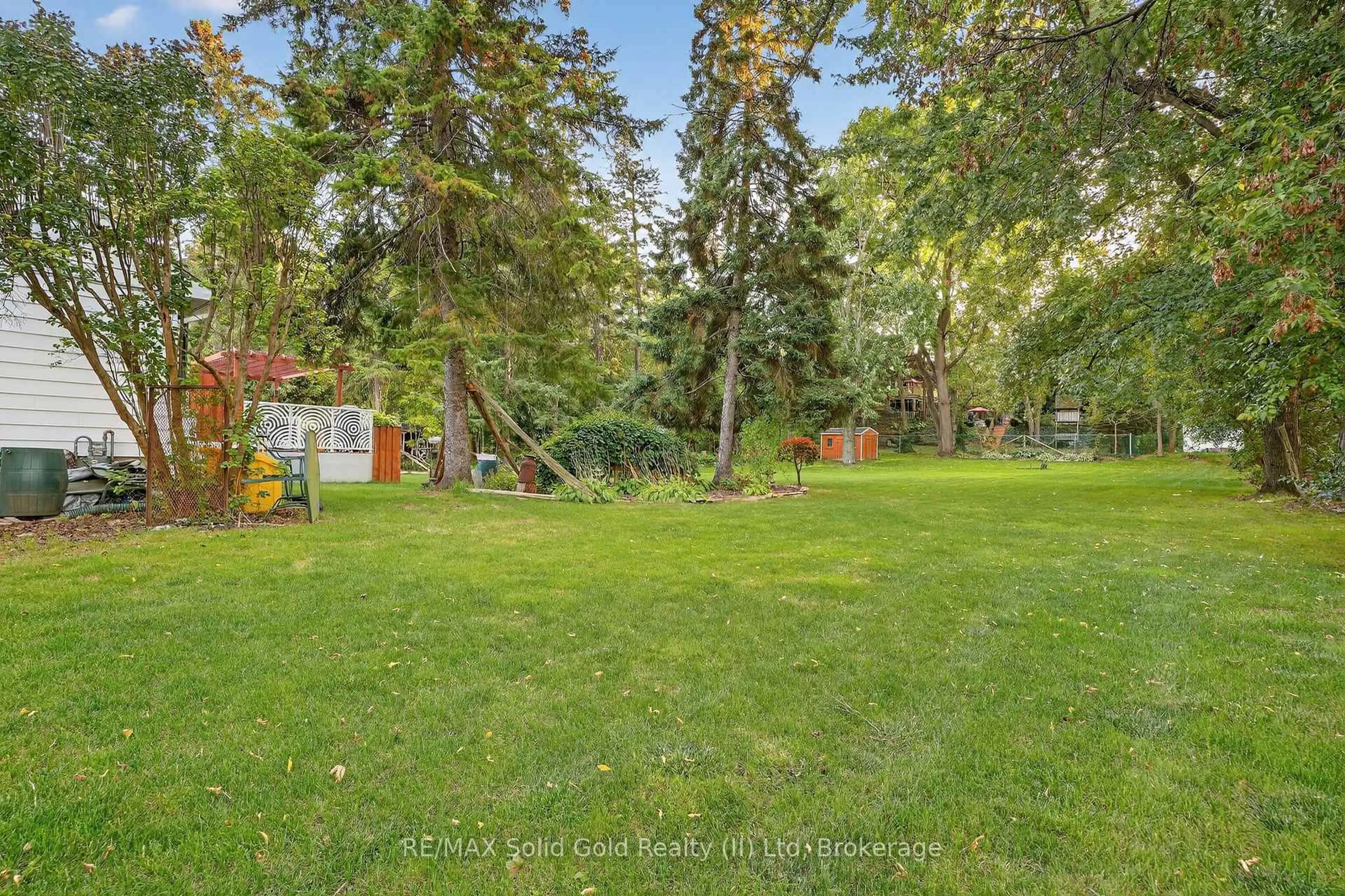 Patio, forest/trees view for 13 Roosevelt Ave, Waterloo Ontario N2L 2N2