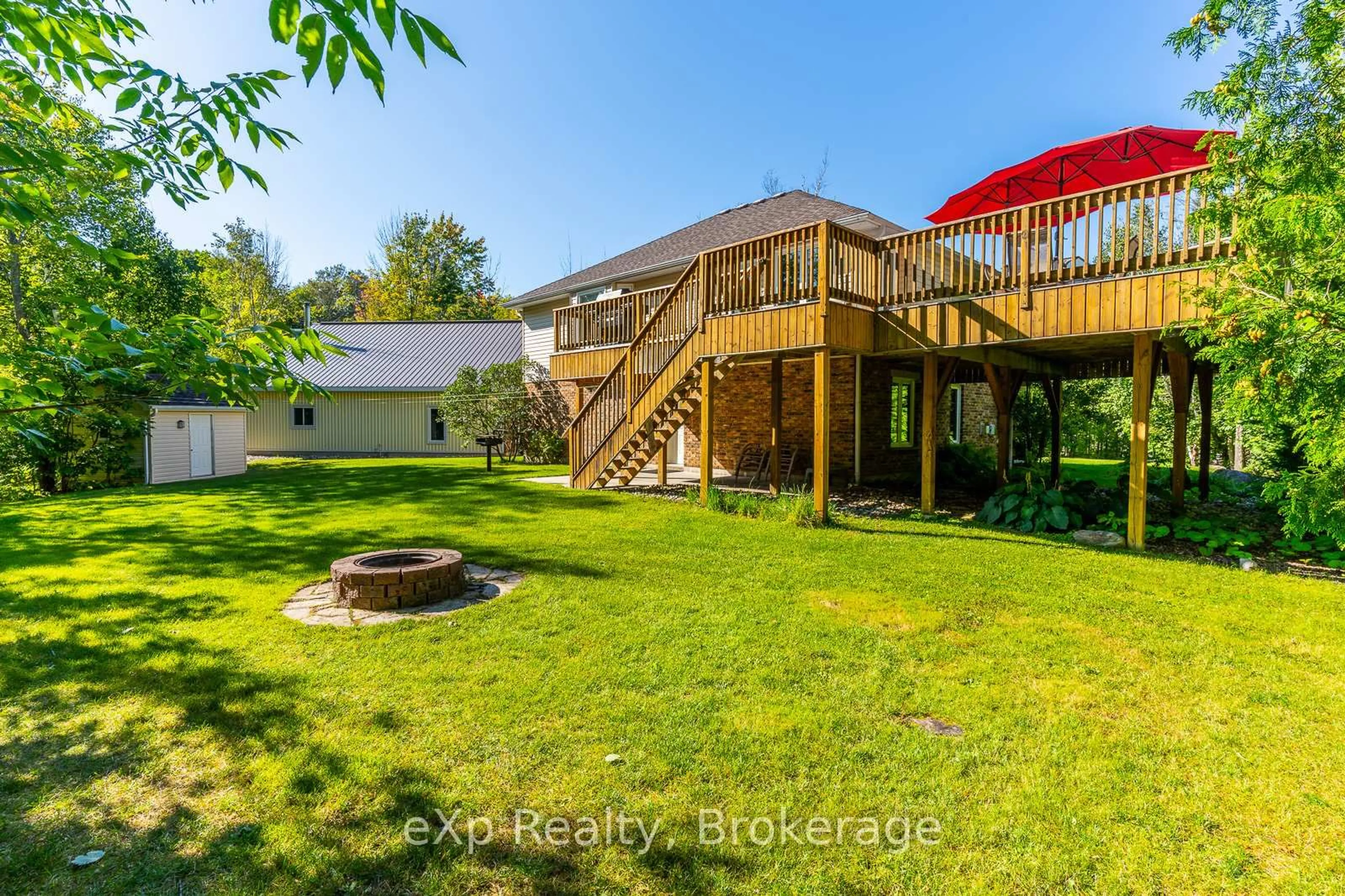 A pic from outside/outdoor area/front of a property/back of a property/a pic from drone, water/lake/river/ocean view for 98 Birch St, South Bruce Peninsula Ontario N0H 2G0