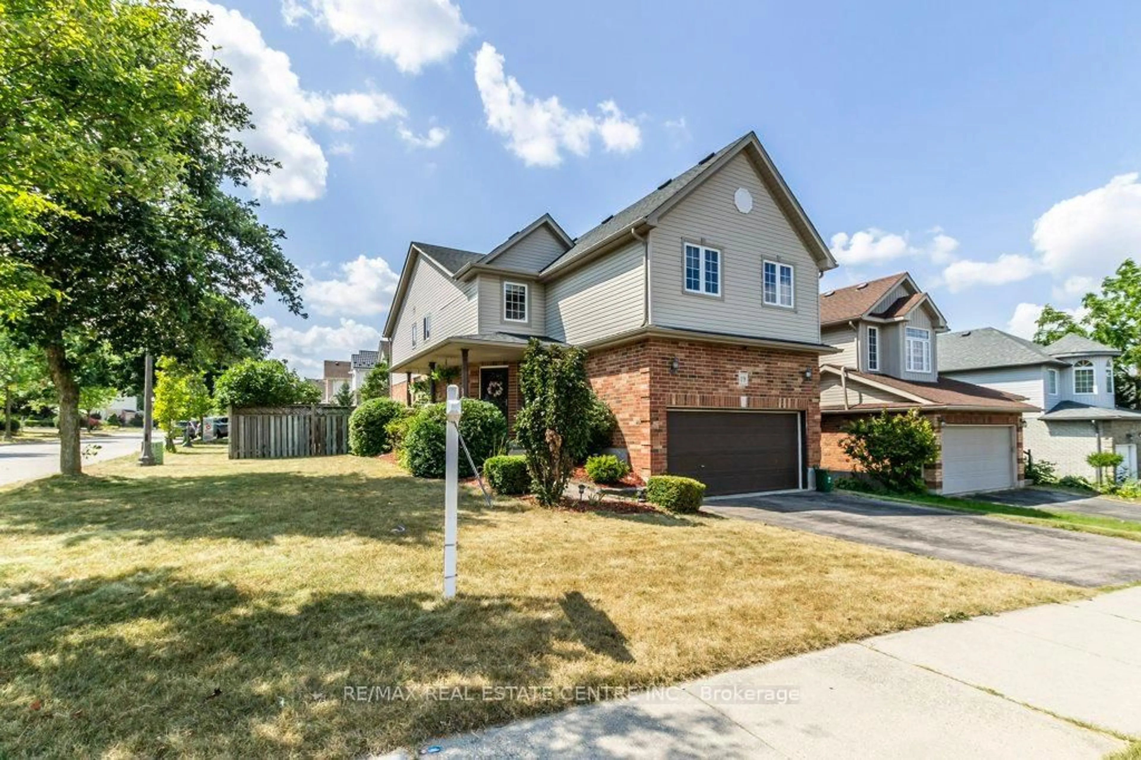 Home with brick exterior material, street for 19 Apple Ridge Dr, Kitchener Ontario N2P 2S2