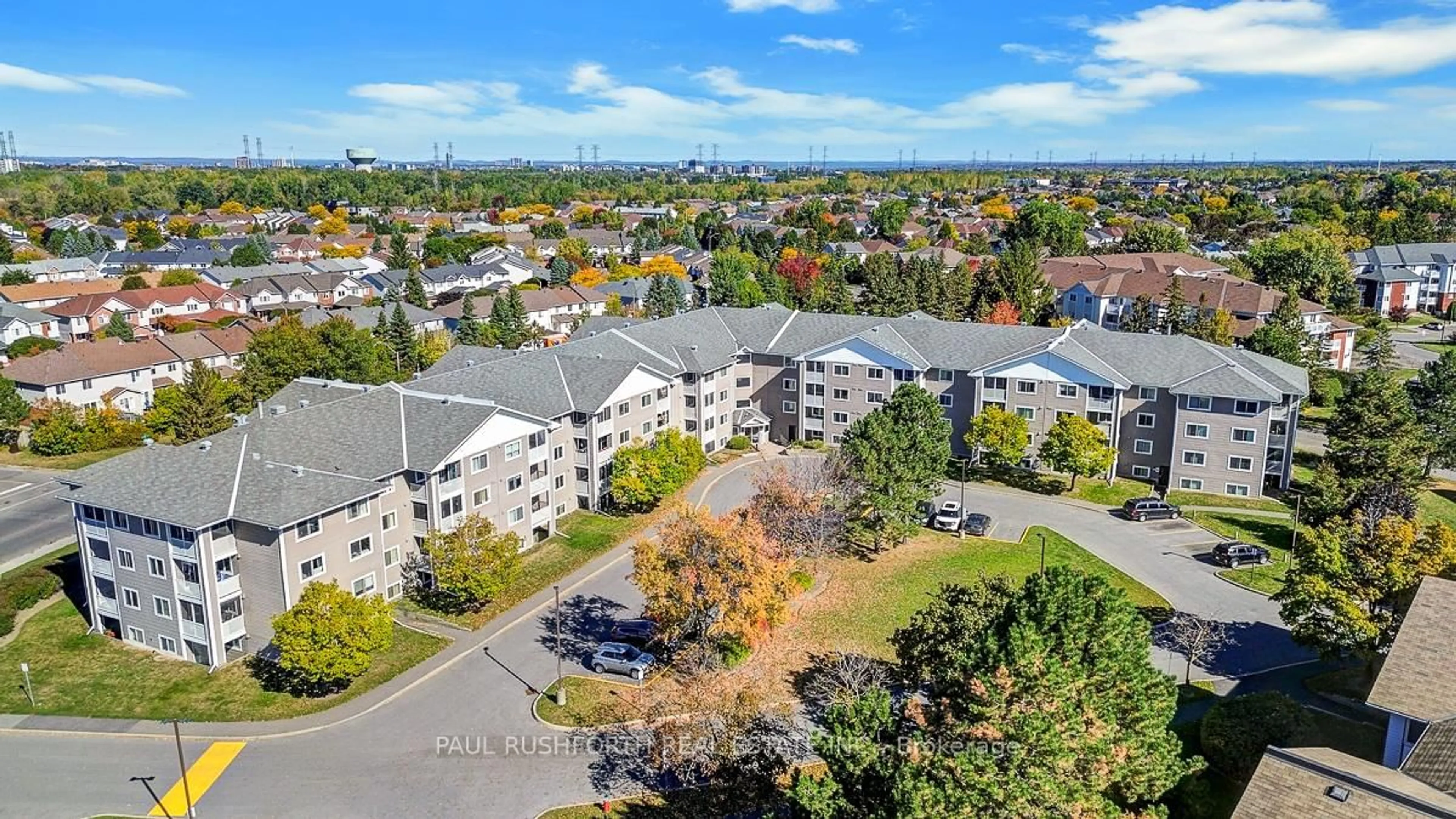 A pic from outside/outdoor area/front of a property/back of a property/a pic from drone, unknown for 316 Lorry Greenberg Dr #322, Ottawa Ontario K1T 2P4