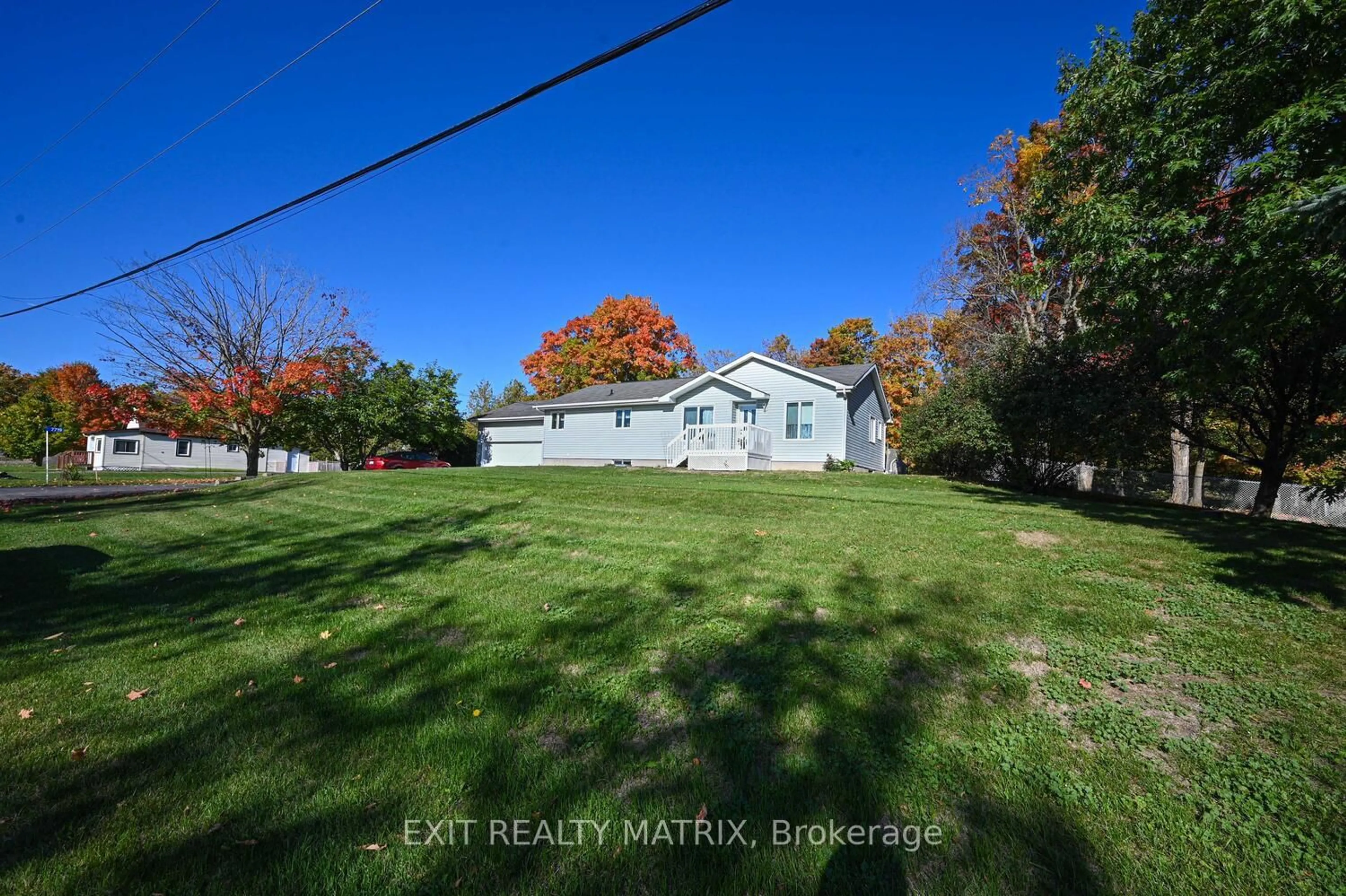 A pic from outside/outdoor area/front of a property/back of a property/a pic from drone, water/lake/river/ocean view for 7719 Lawrence St, Vernon Ontario K0A 3J0