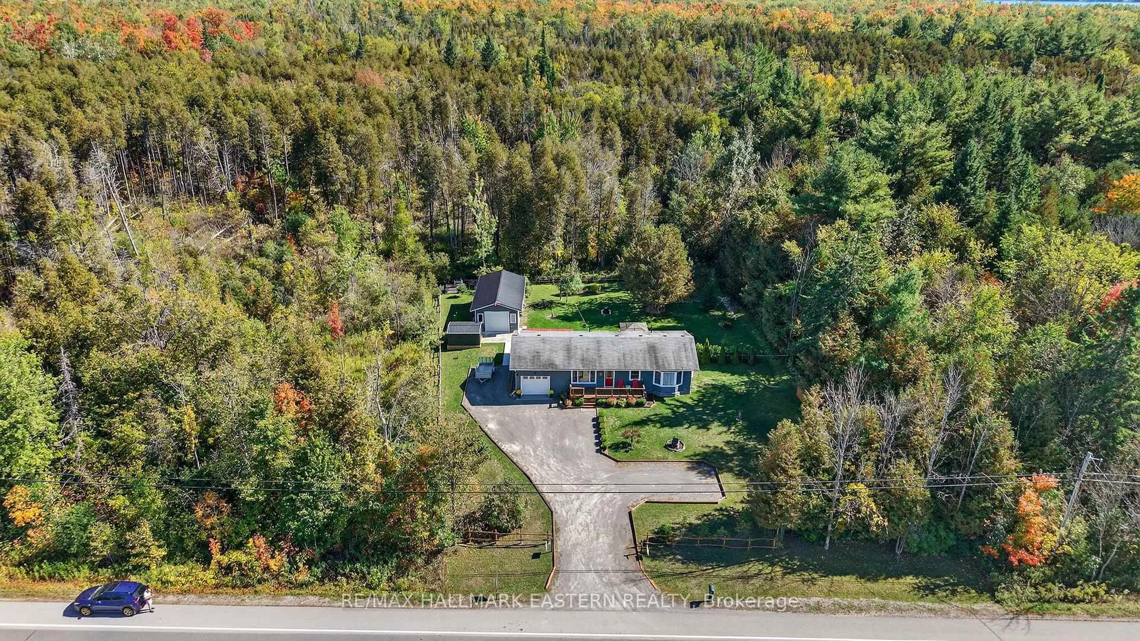 A pic from outside/outdoor area/front of a property/back of a property/a pic from drone, unknown for 4379 Highway 28, Selwyn Ontario K0L 2H0