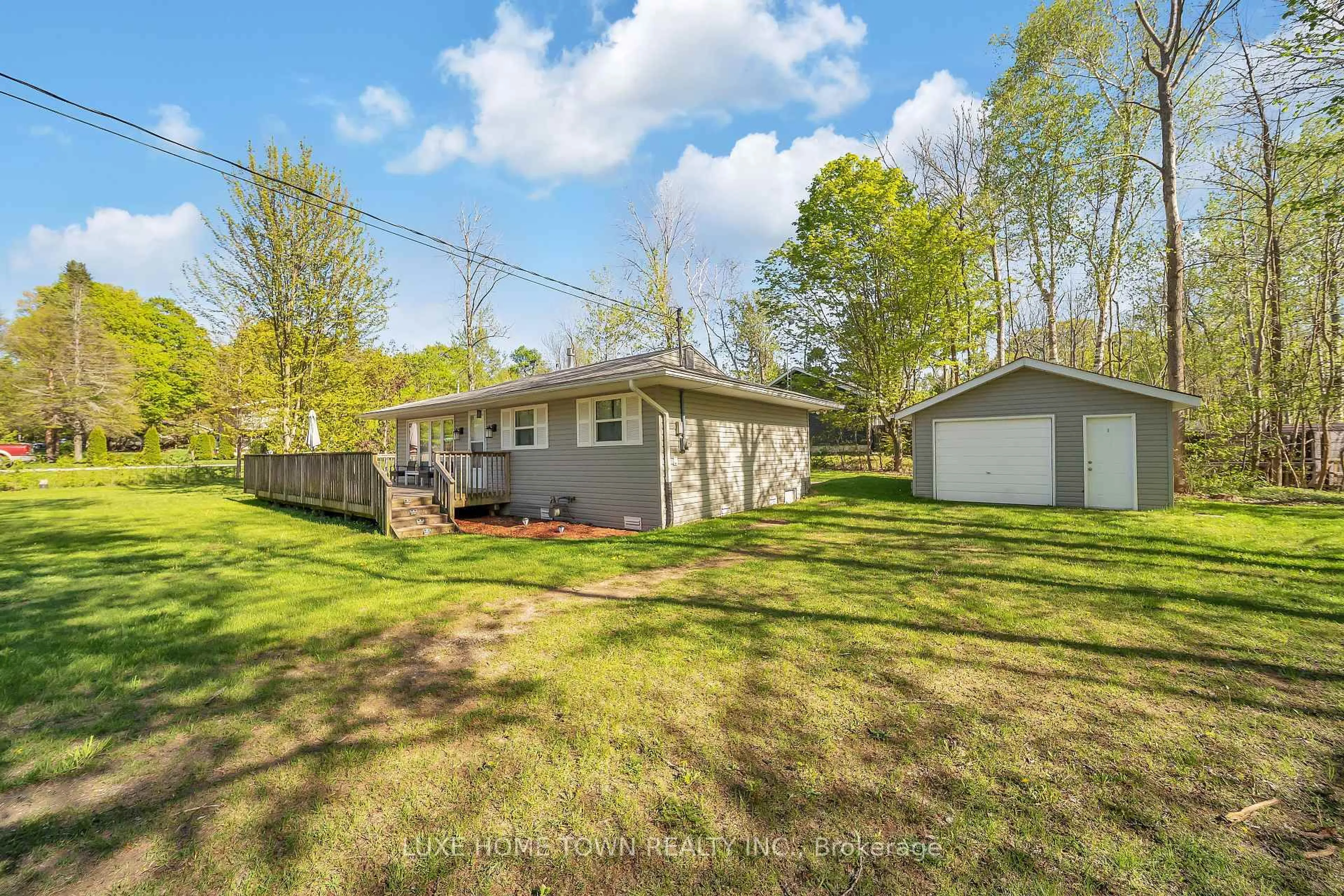 A pic from outside/outdoor area/front of a property/back of a property/a pic from drone, water/lake/river/ocean view for 2 BIRCH St, South Bruce Peninsula Ontario N0H 2G0