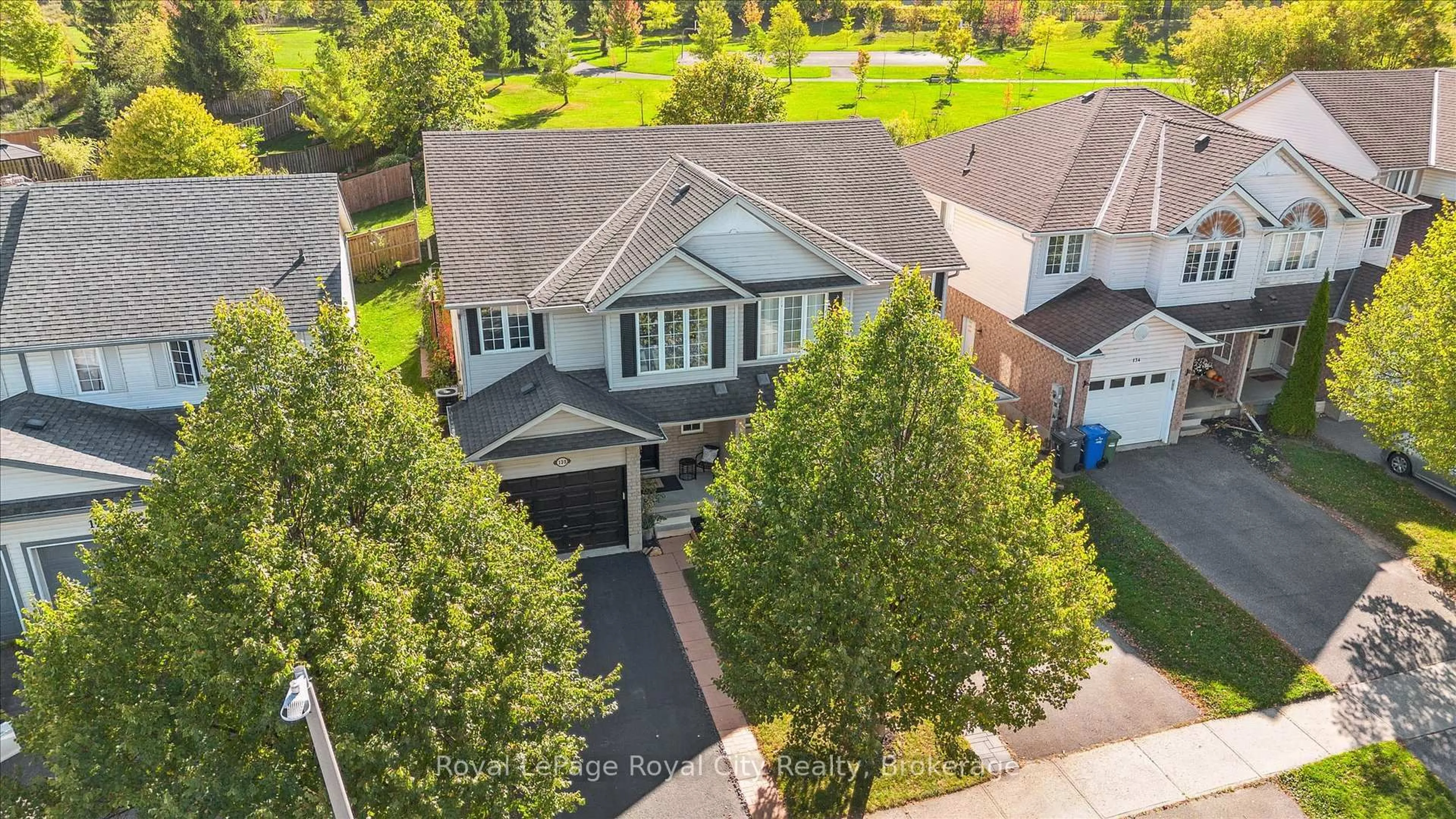 A pic from outside/outdoor area/front of a property/back of a property/a pic from drone, street for 130 Silurian Dr, Guelph Ontario N1E 7G1