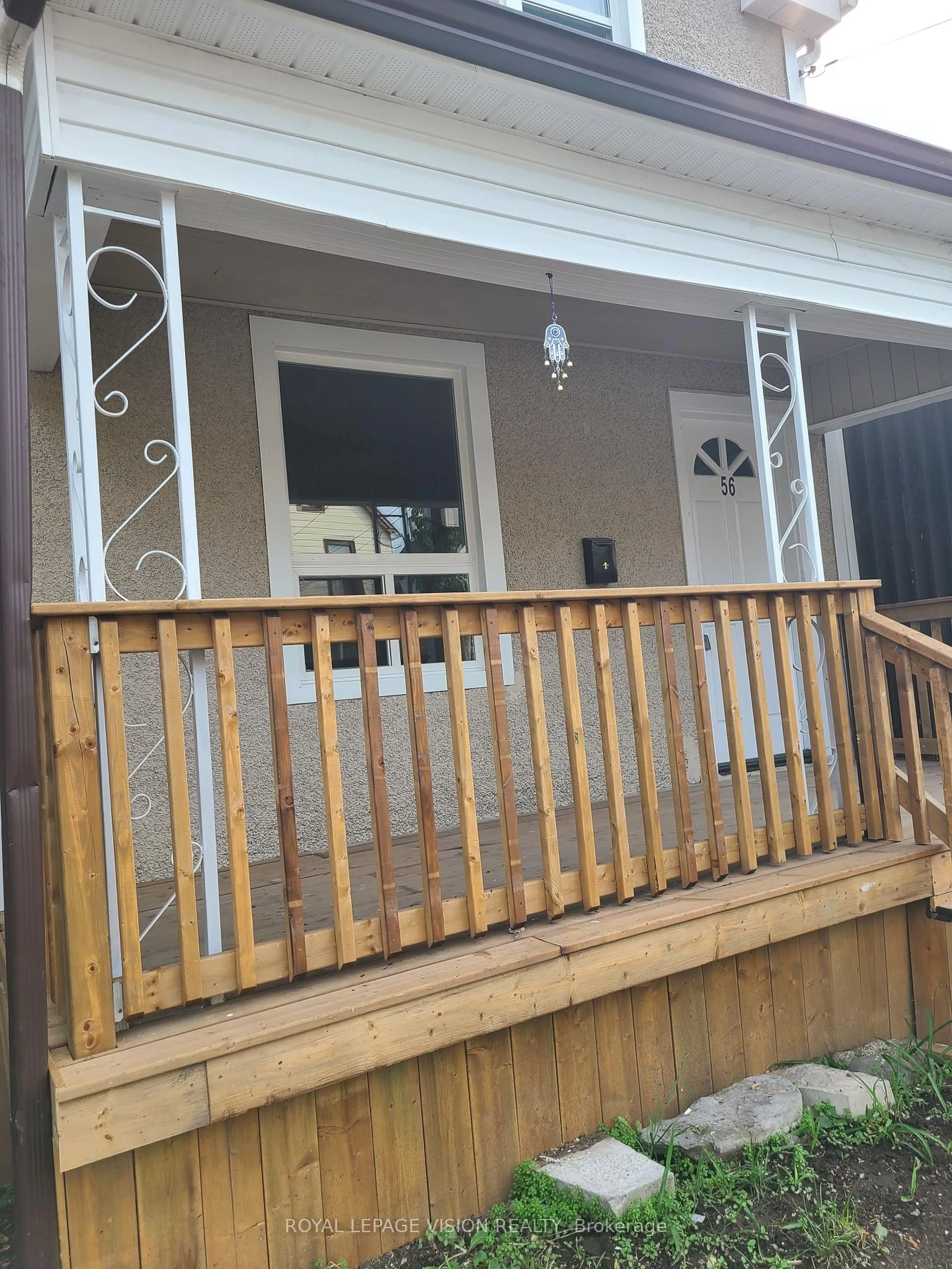 Home with vinyl exterior material, street for 56 Munroe St, Hamilton Ontario L8L 3V7