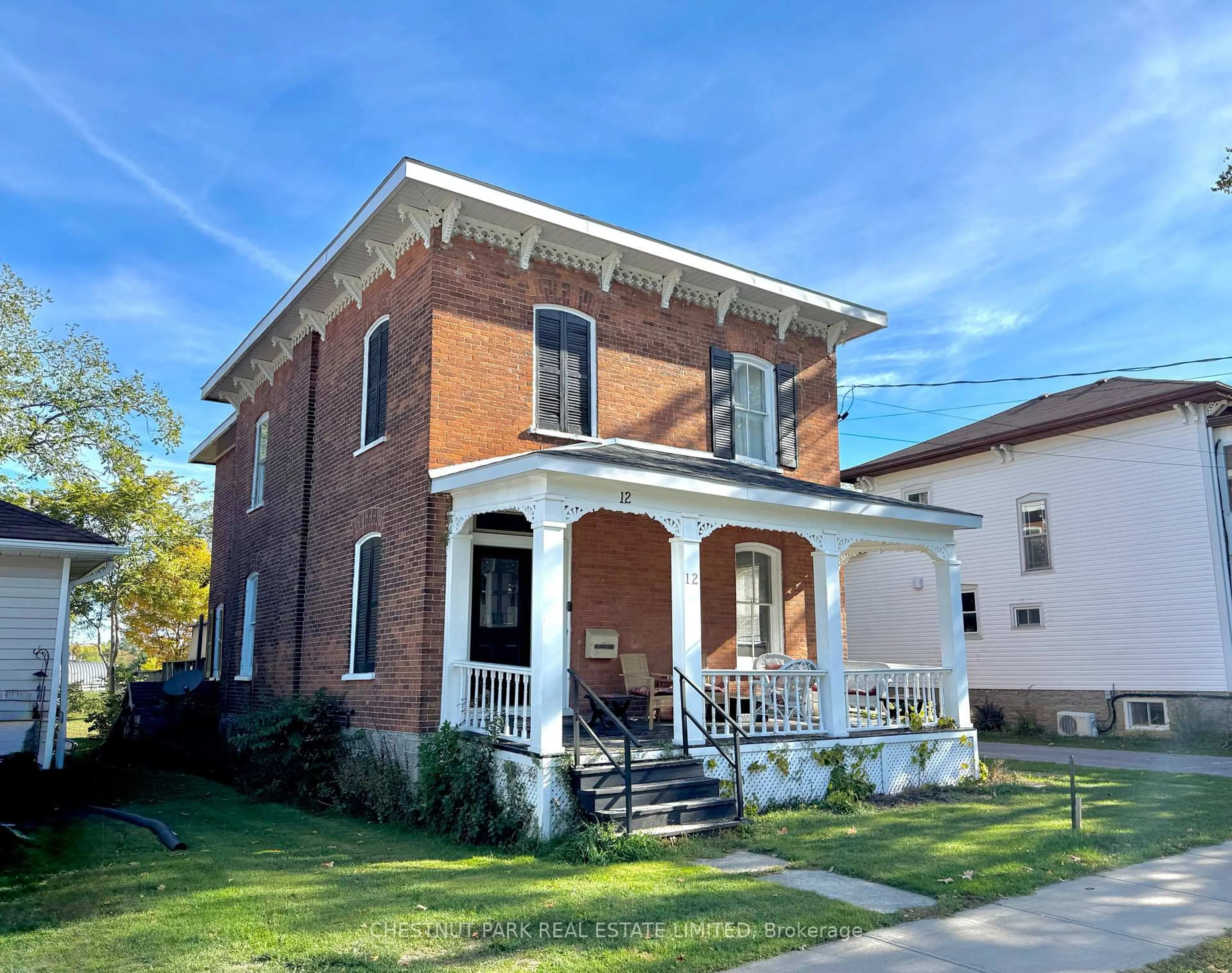 Home with brick exterior material, street for 12 Maple Ave, Prince Edward County Ontario K0K 2T0