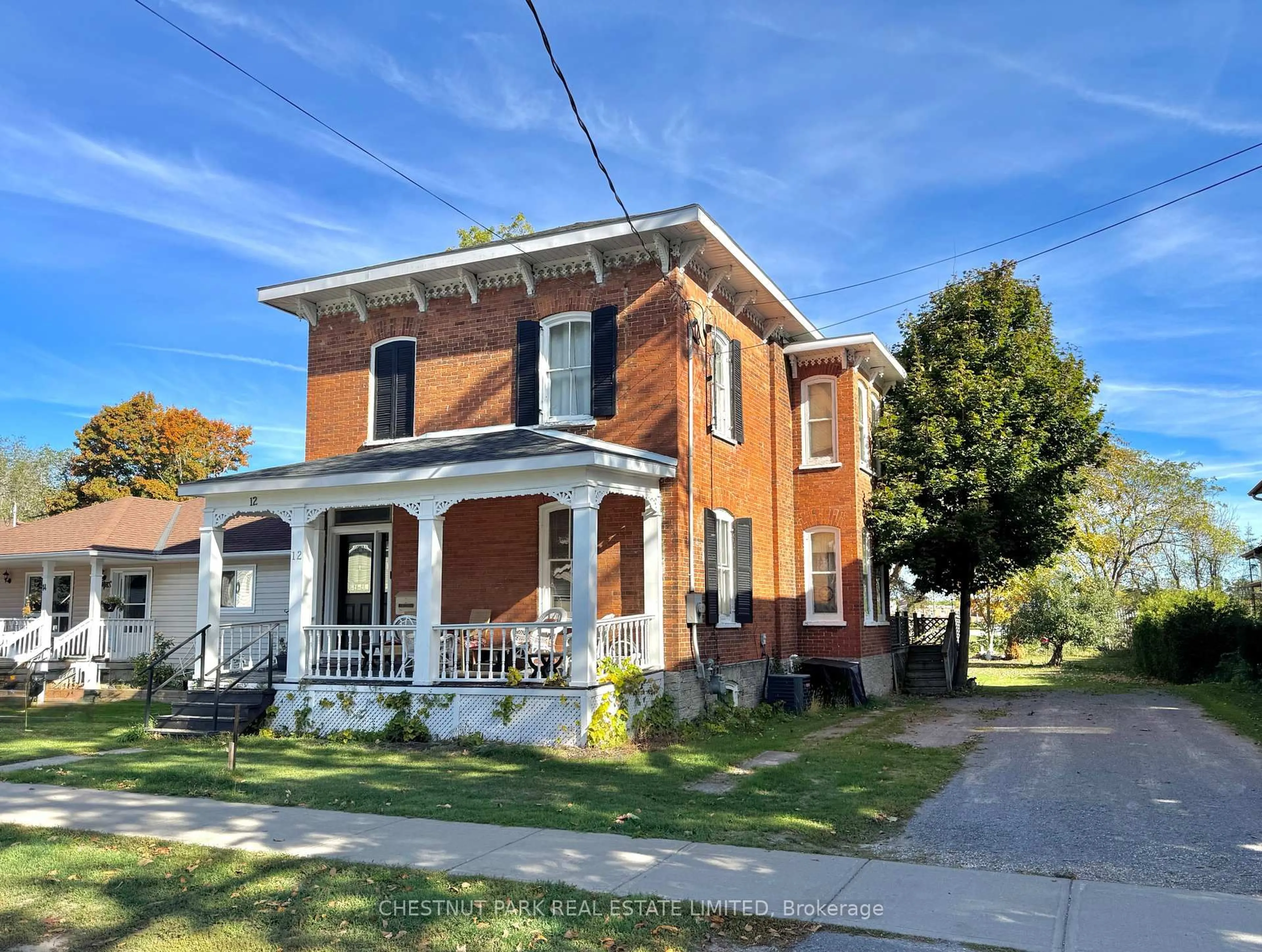 Home with brick exterior material, street for 12 Maple Ave, Prince Edward County Ontario K0K 2T0