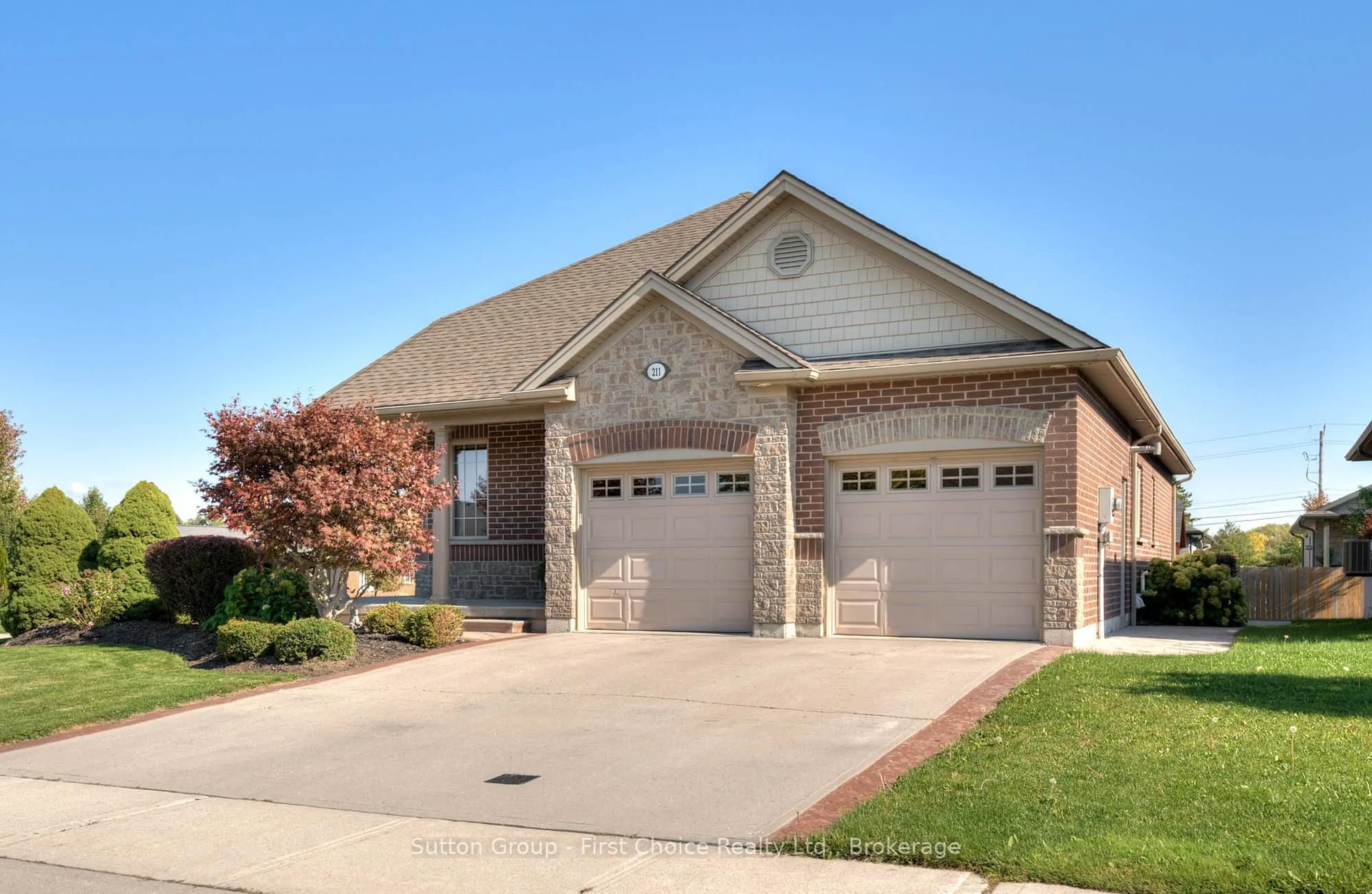 Home with brick exterior material, street for 211 Sunset Dr, West Perth Ontario N0K 1W0